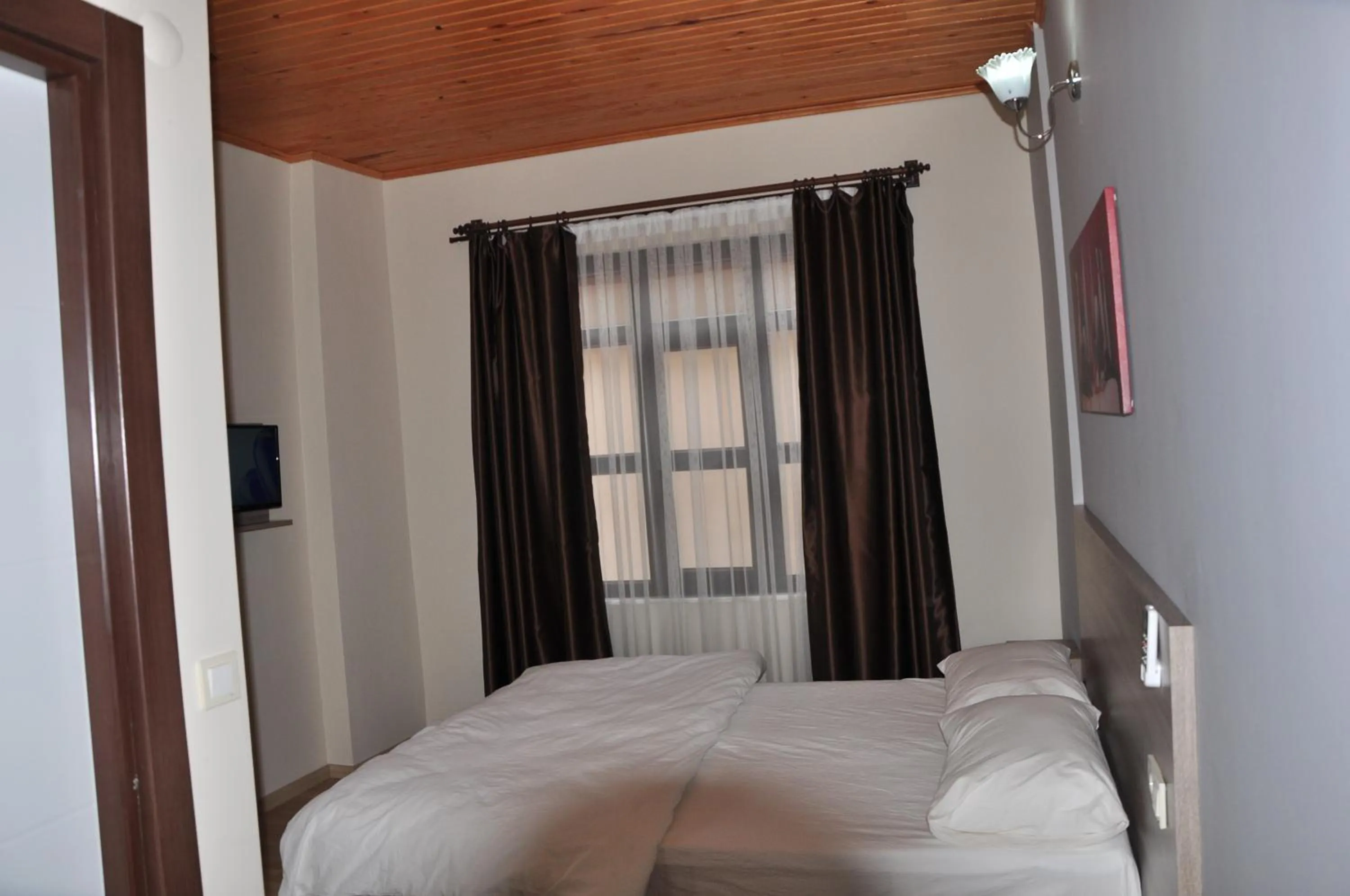 TV and multimedia, Bed in SunAnatolia Otel