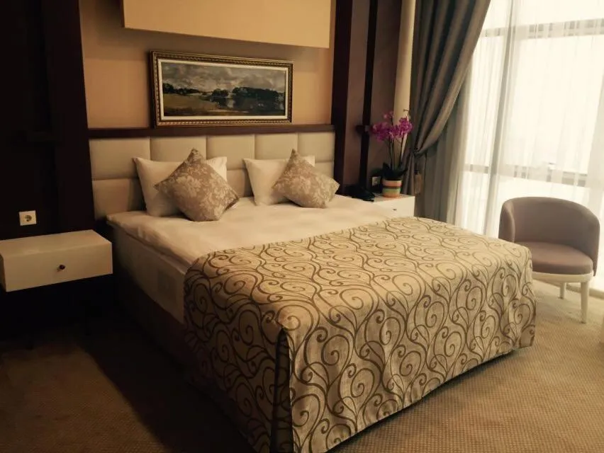 Bed in Vivaldi Park Hotel