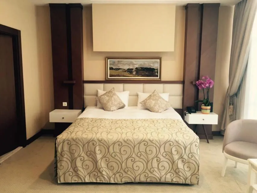 Bed in Vivaldi Park Hotel