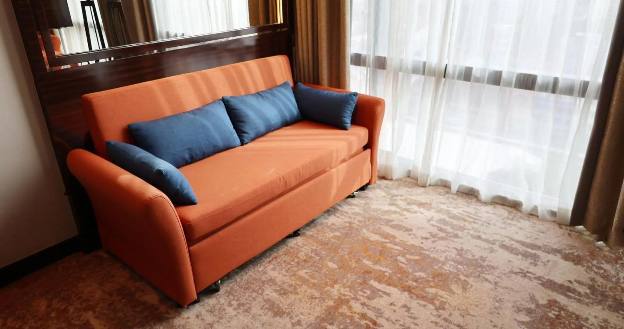 Seating area in Holiday Inn Singapore Little India by IHG