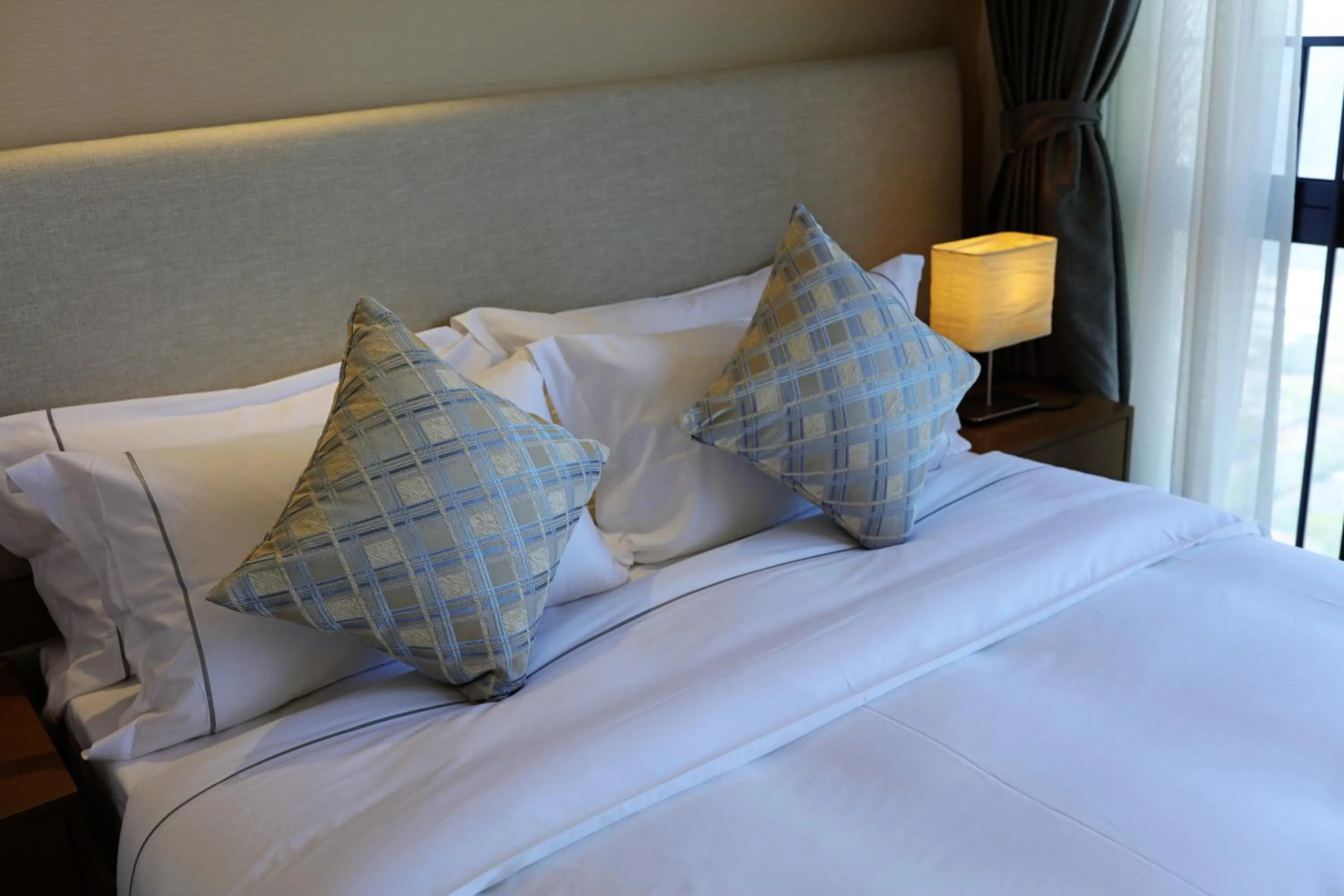 Bed in Yuwa Serviced Residence