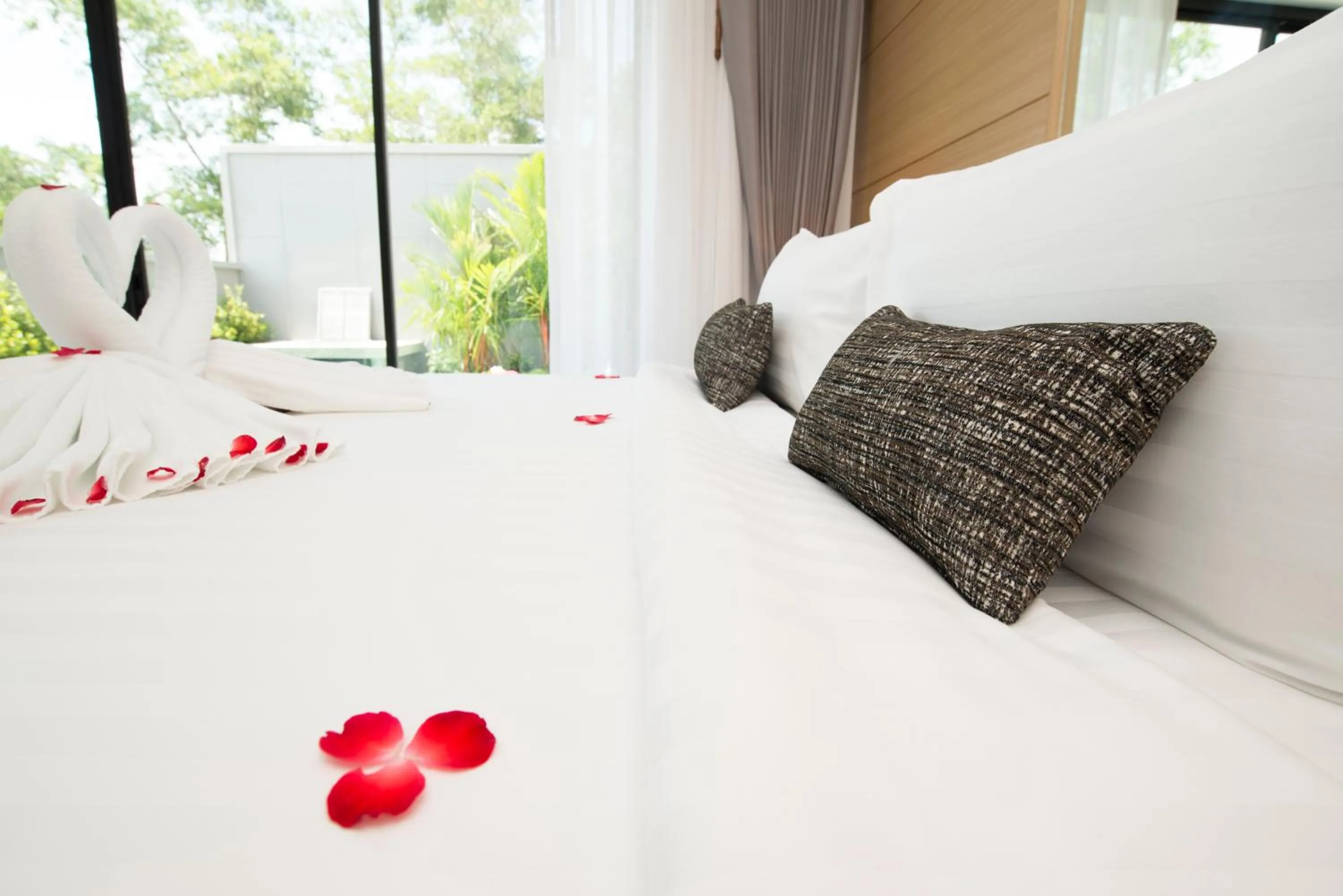 Bed in Pumeria Resort Phuket - SHA Plus