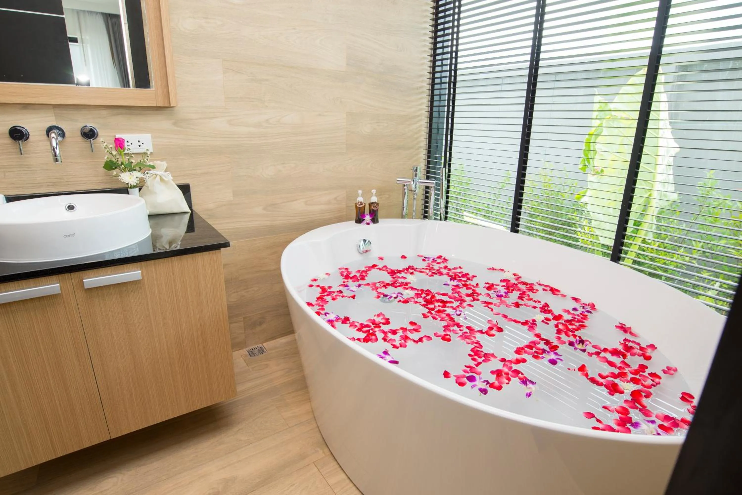 Bathroom in Pumeria Resort Phuket - SHA Plus