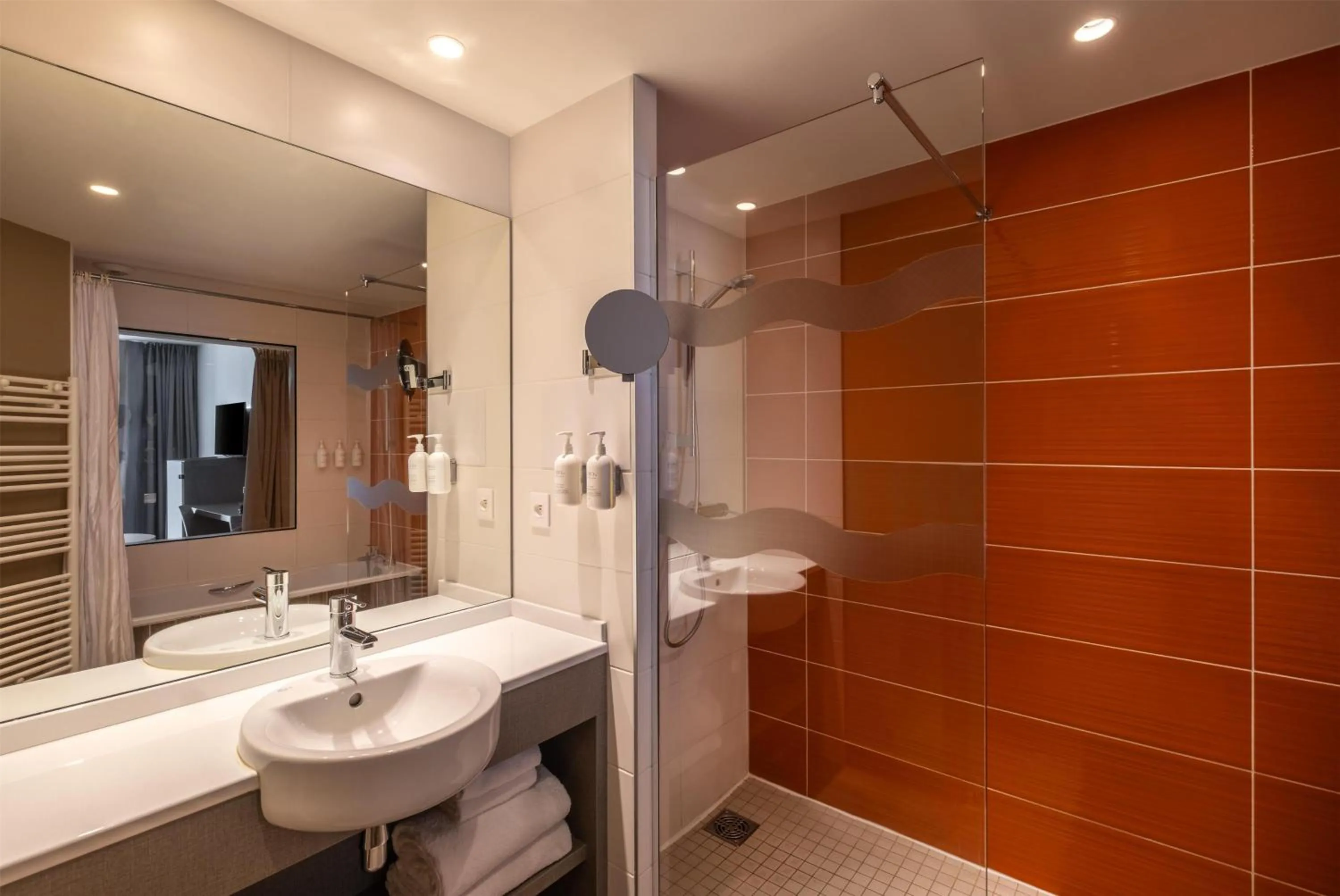Bathroom in Spark by Hilton Lyon Park Saone