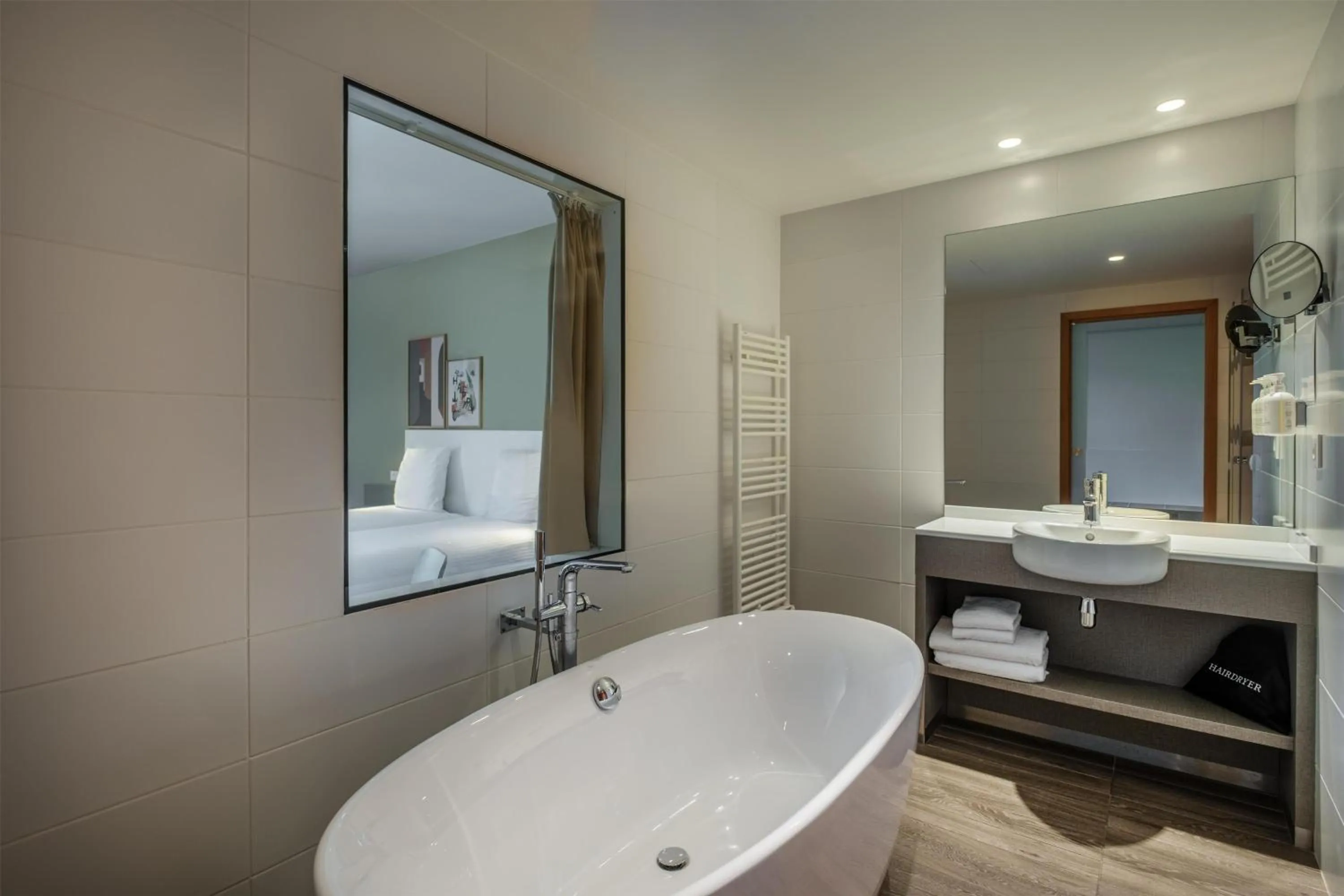 Bathroom in Spark by Hilton Lyon Park Saone