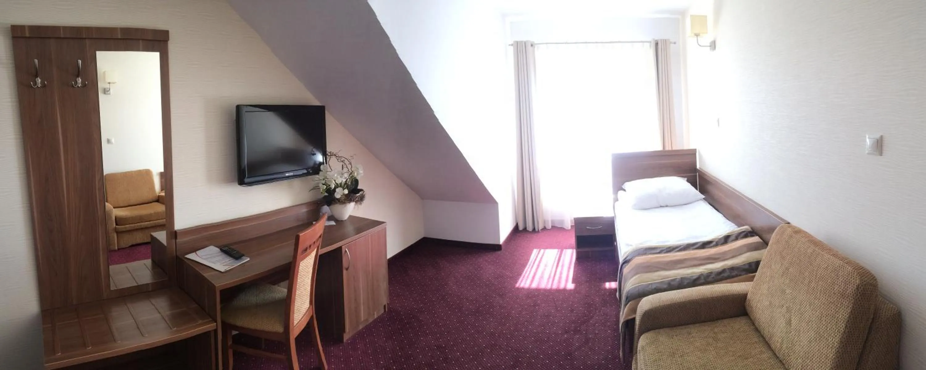 Photo of the whole room in Hotel DYMINY