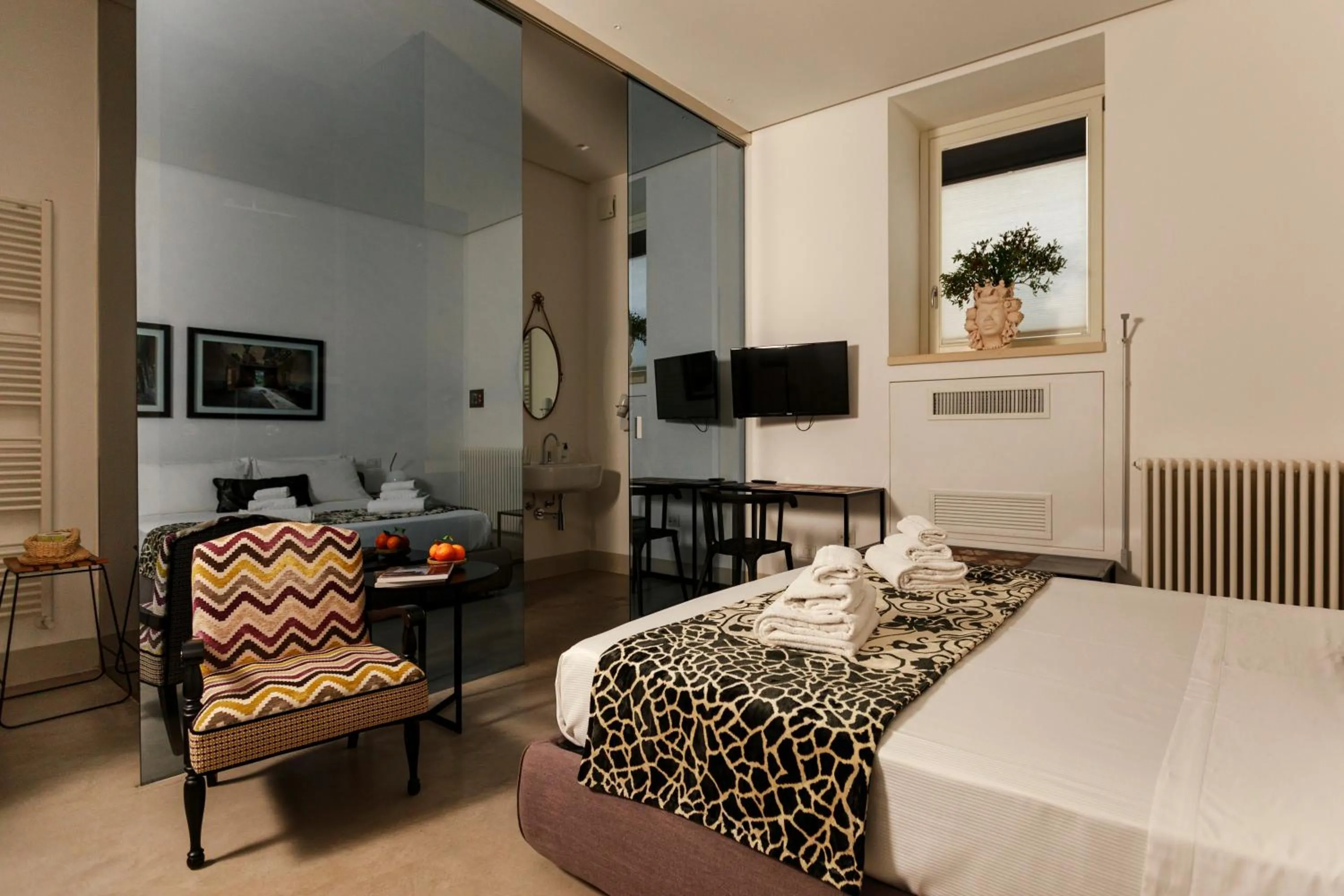 Bed in Embrace Sicily Guest House