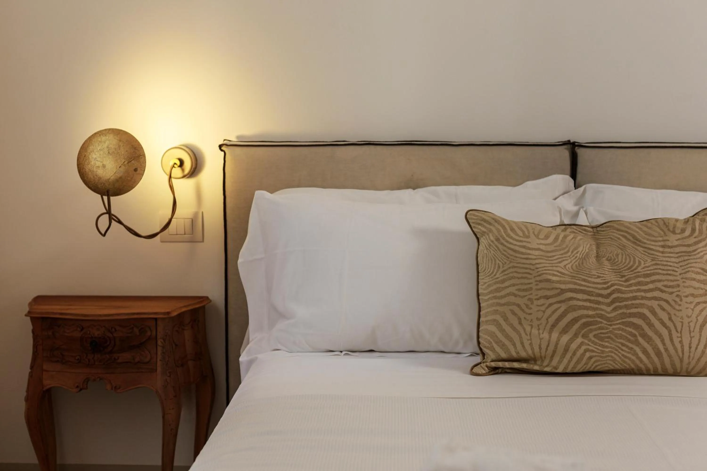 Bed in Embrace Sicily Guest House