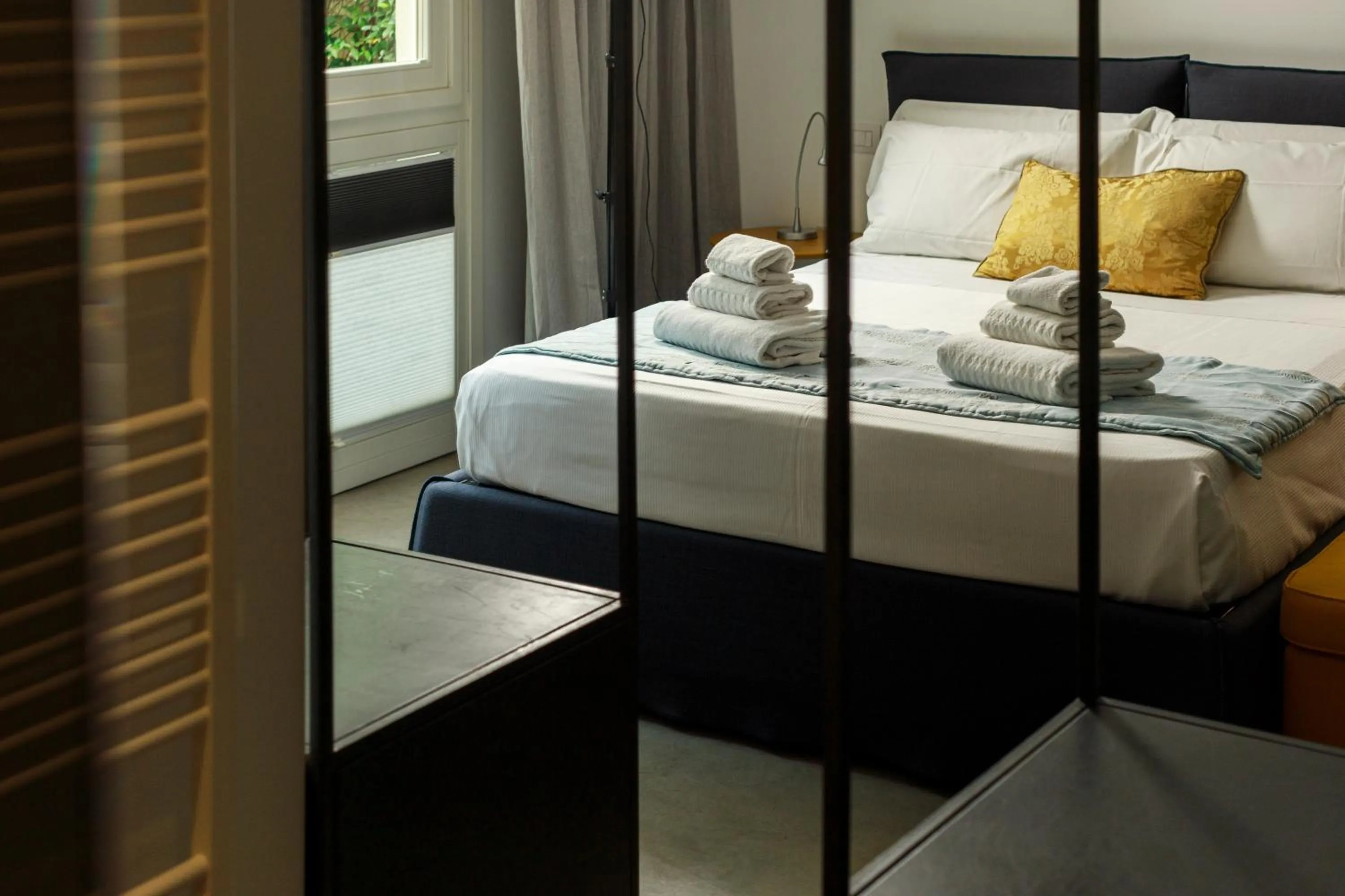 Bed in Embrace Sicily Guest House