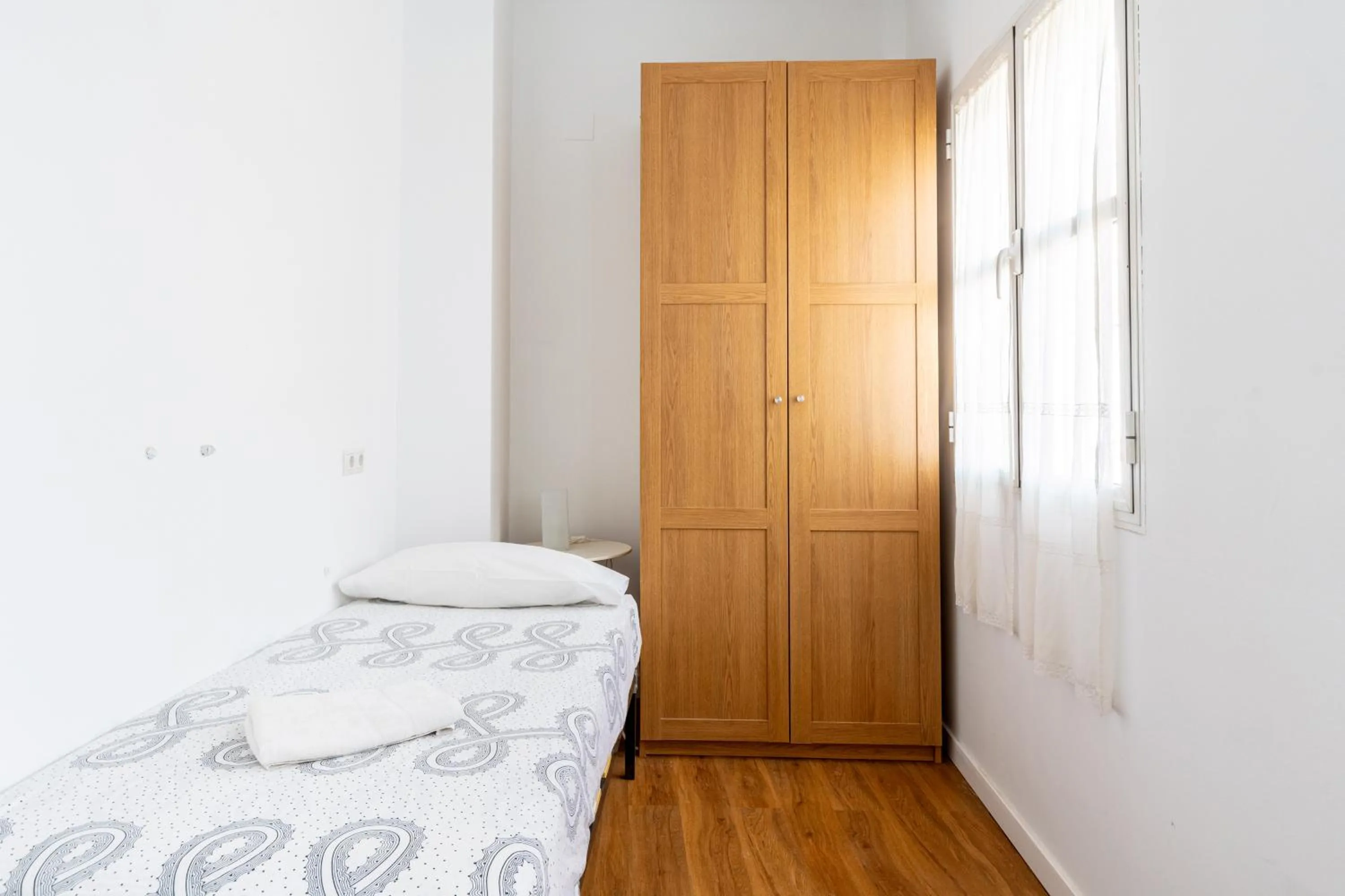 Bed in HOUSE SEVILLANA 6 habitaciones