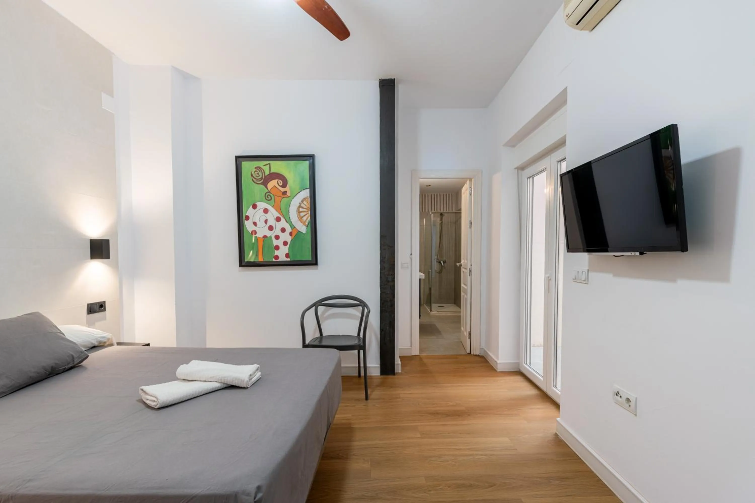 Bed in HOUSE SEVILLANA 6 habitaciones