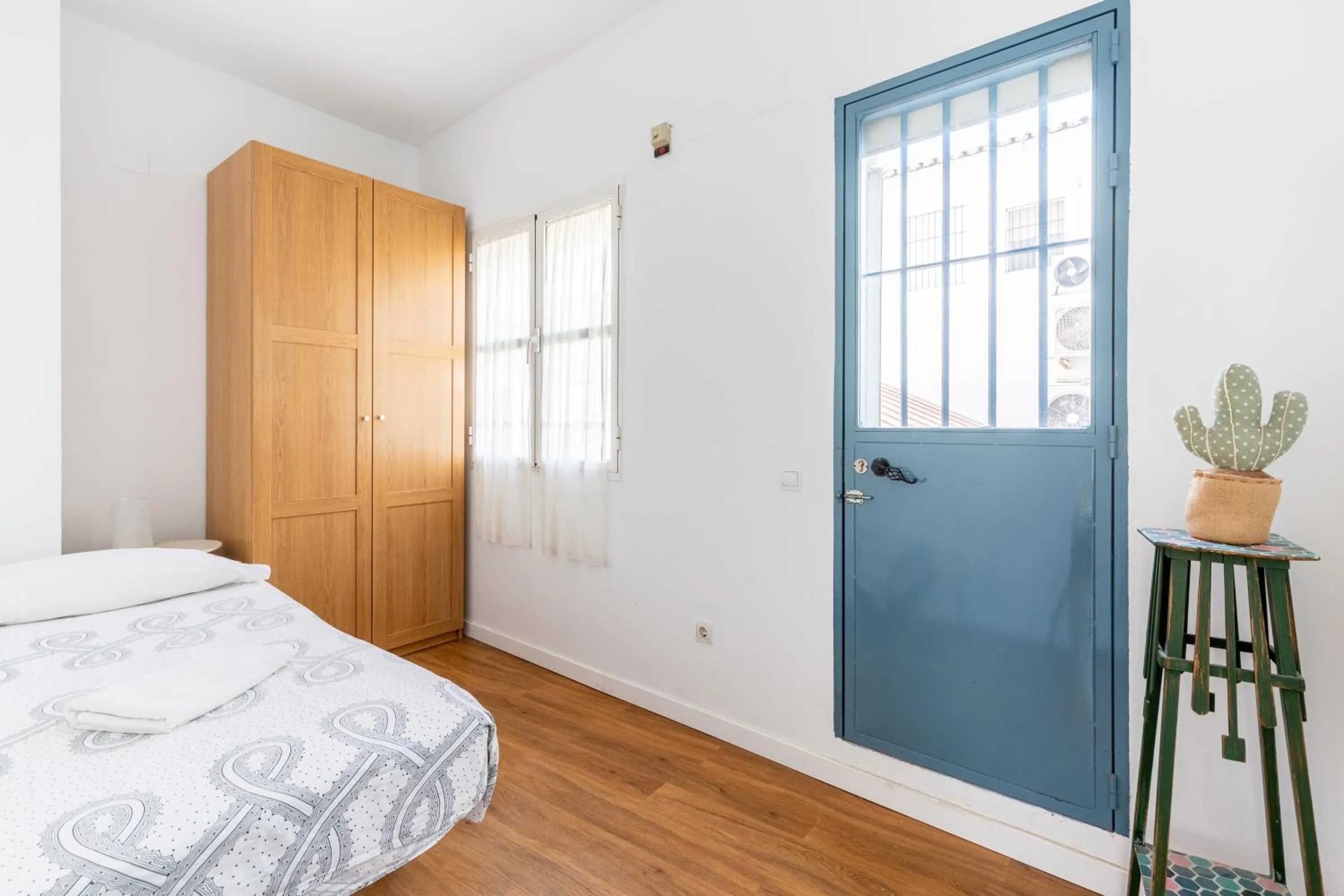 Bed in HOUSE SEVILLANA 6 habitaciones