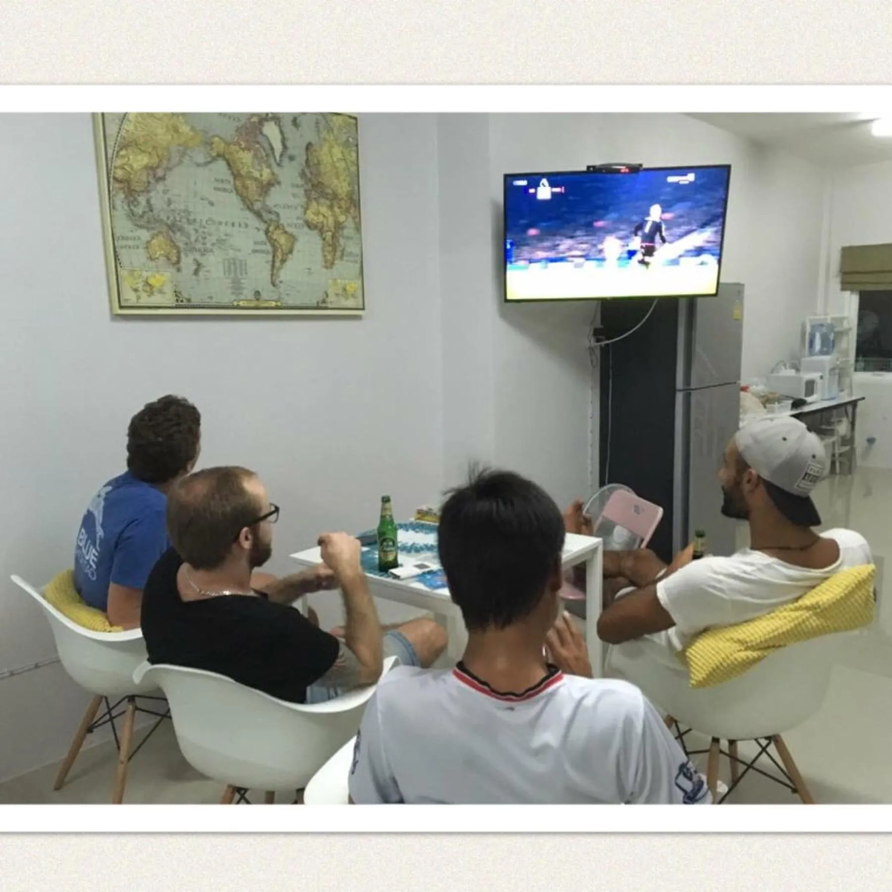 Communal lounge/ TV room in DKaYa Hostel