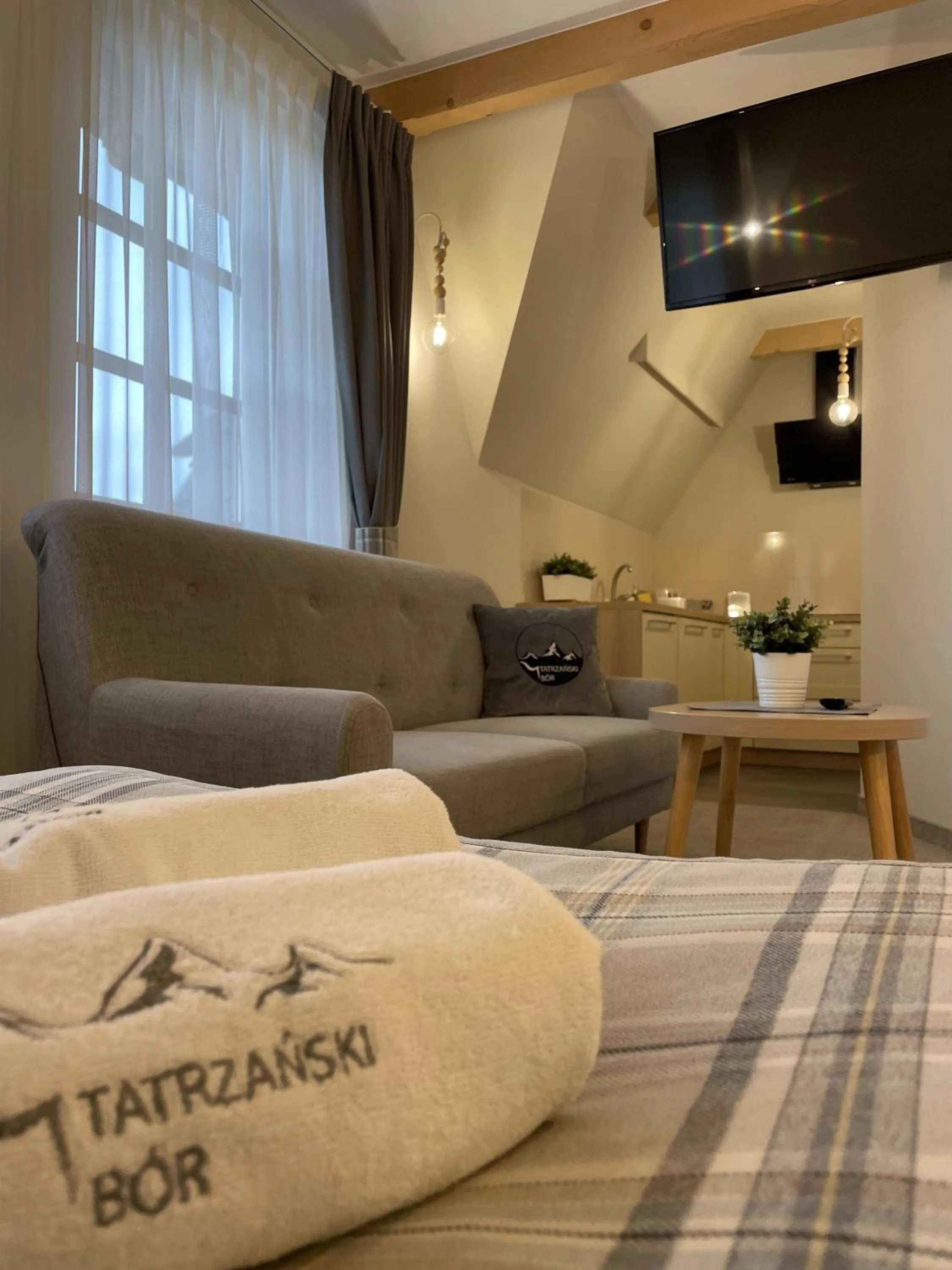 Kitchen or kitchenette, Bed in Tatrzański Bór Apartamenty