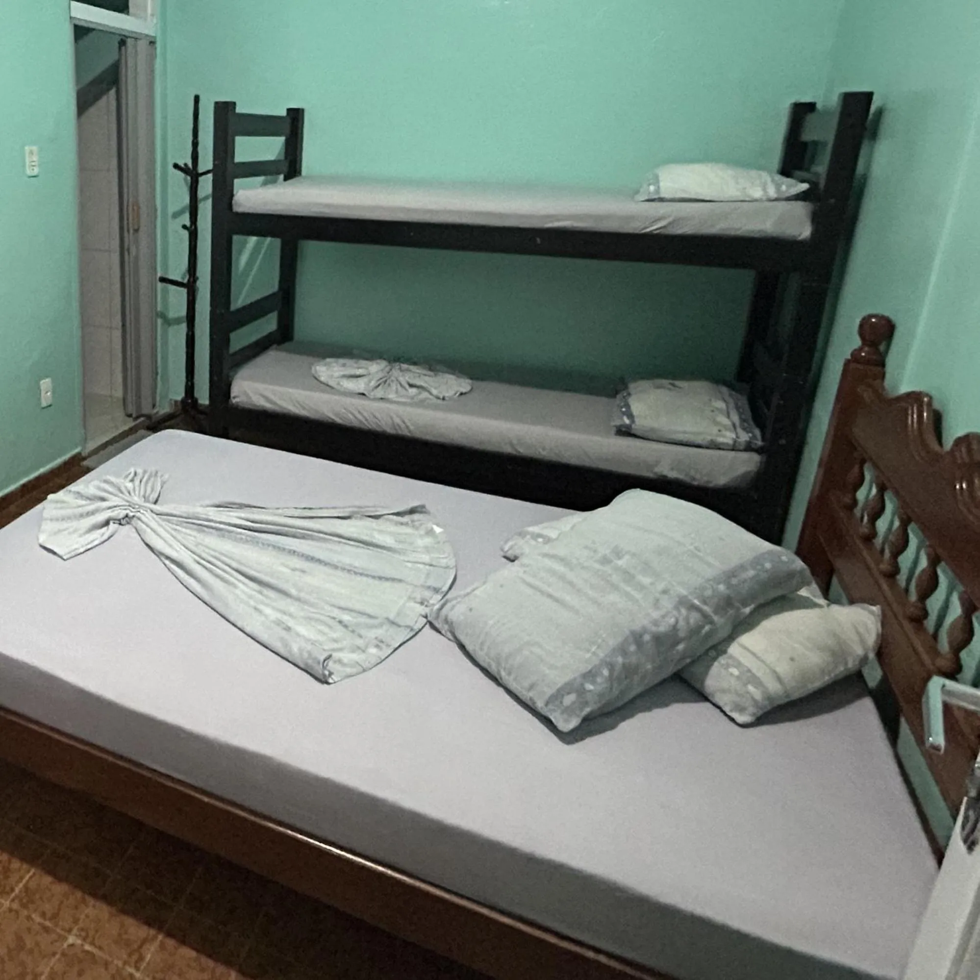 Bed in Pousada Orquidário