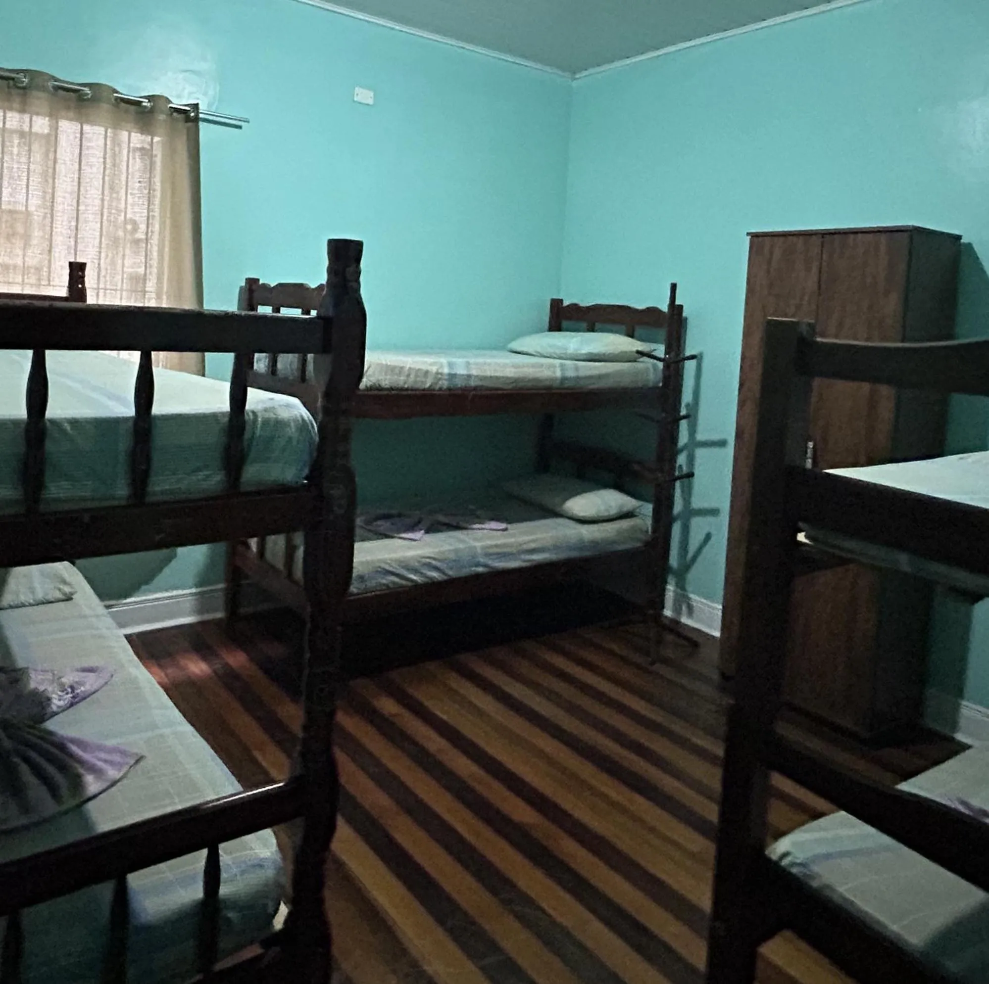 Bed in Pousada Orquidário