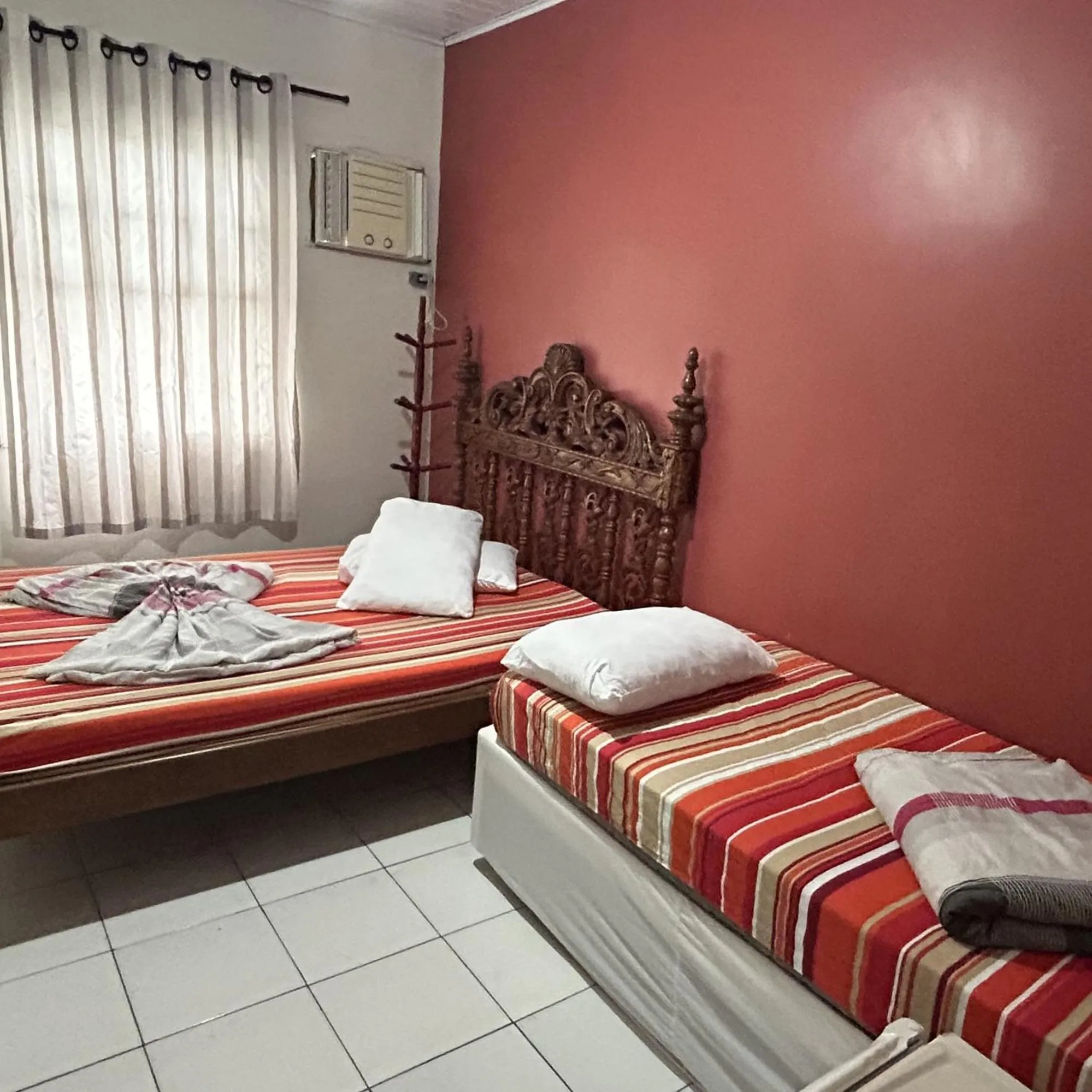 Bed in Pousada Orquidário