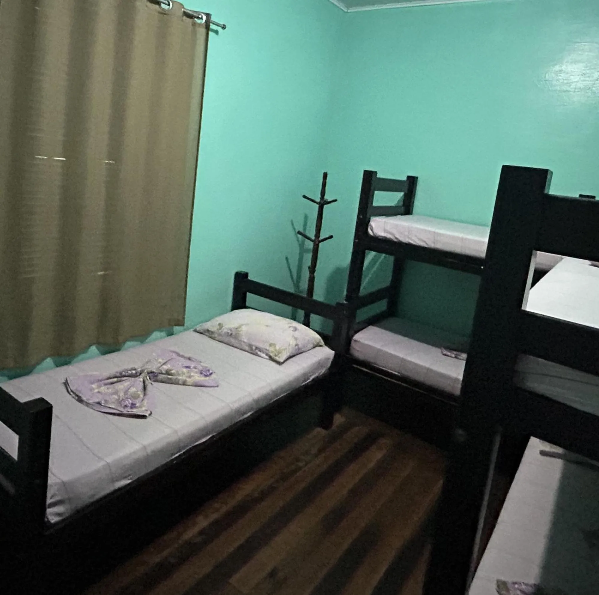 Bed in Pousada Orquidário