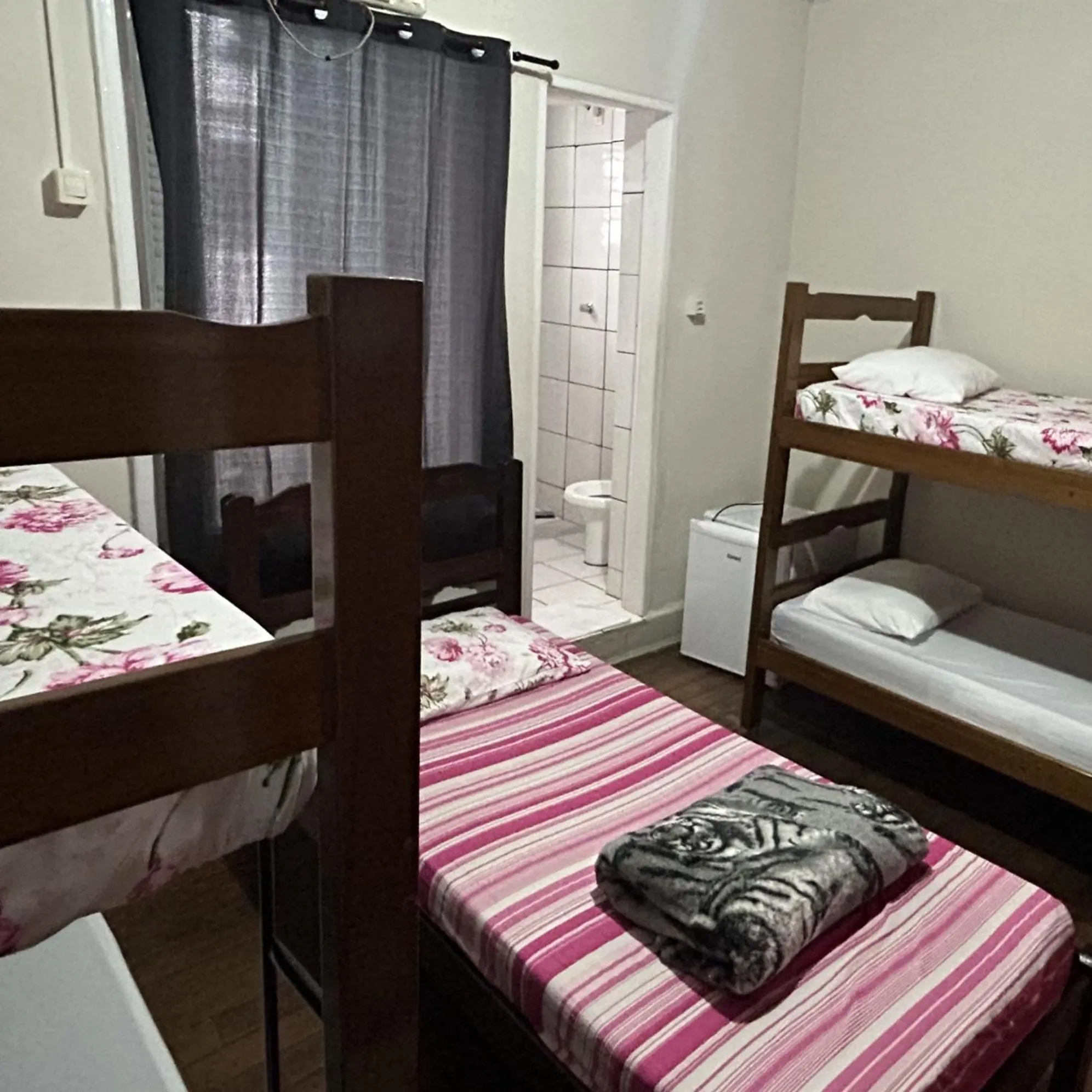 Bed in Pousada Orquidário