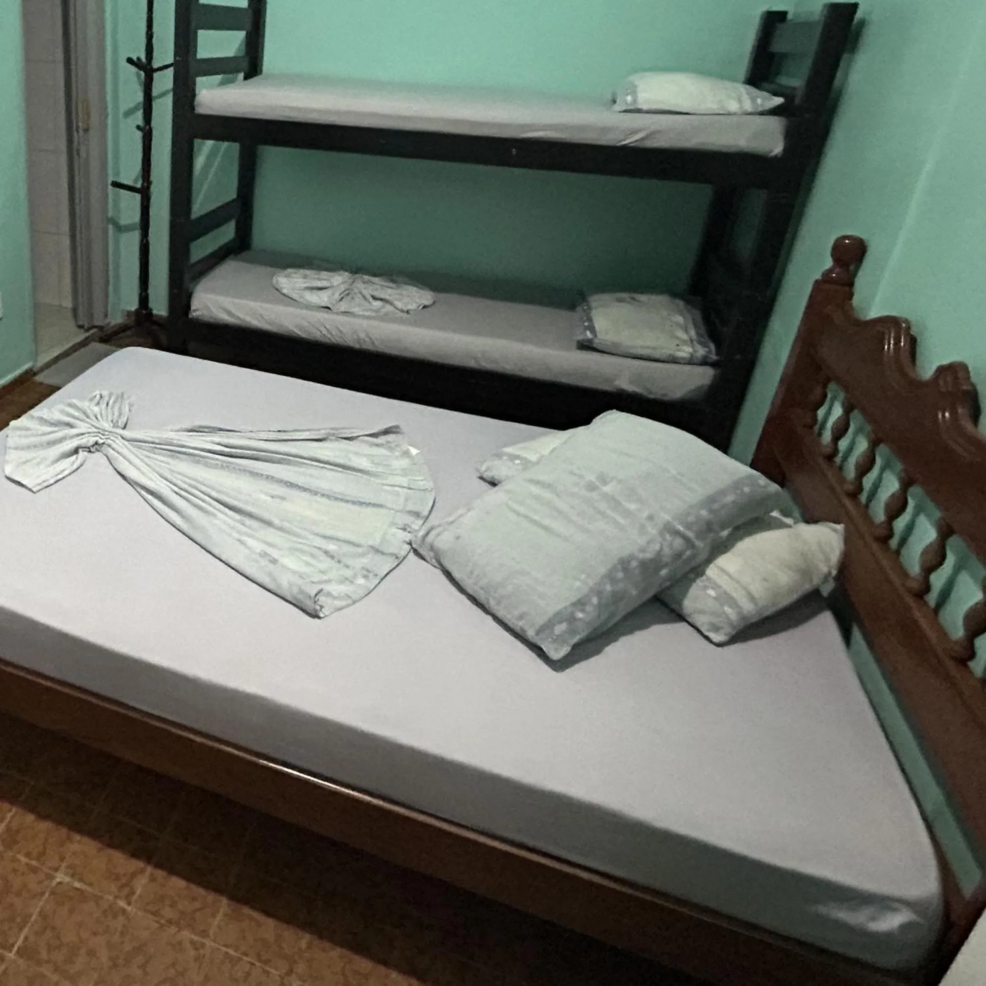 Bed in Pousada Orquidário