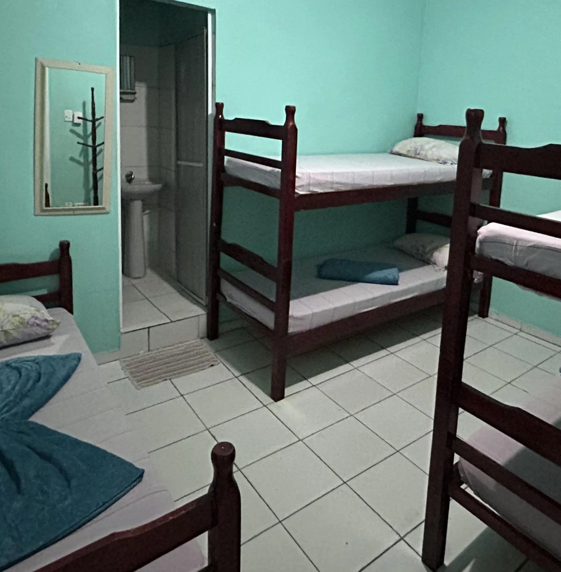 Bed in Pousada Orquidário