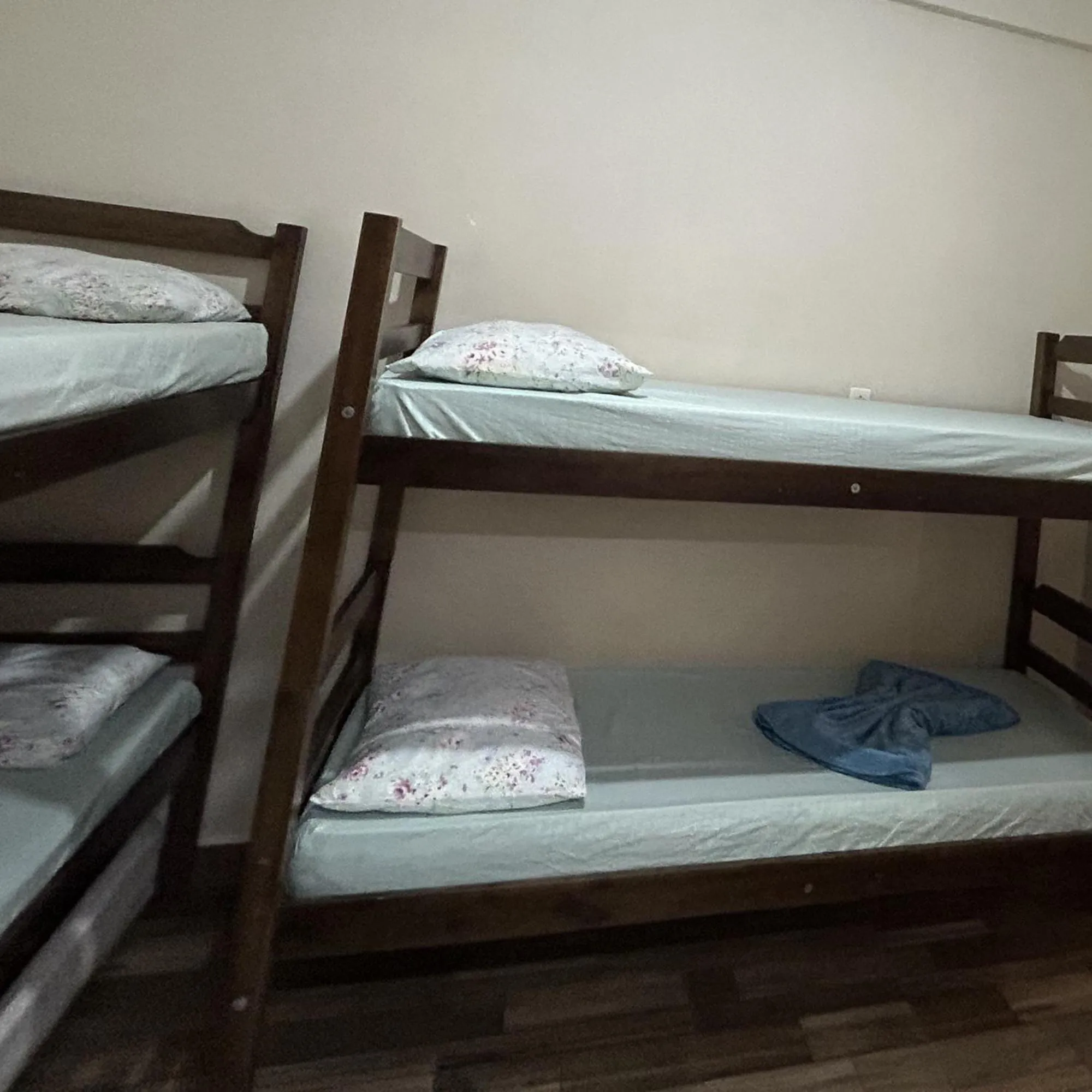 Bed in Pousada Orquidário