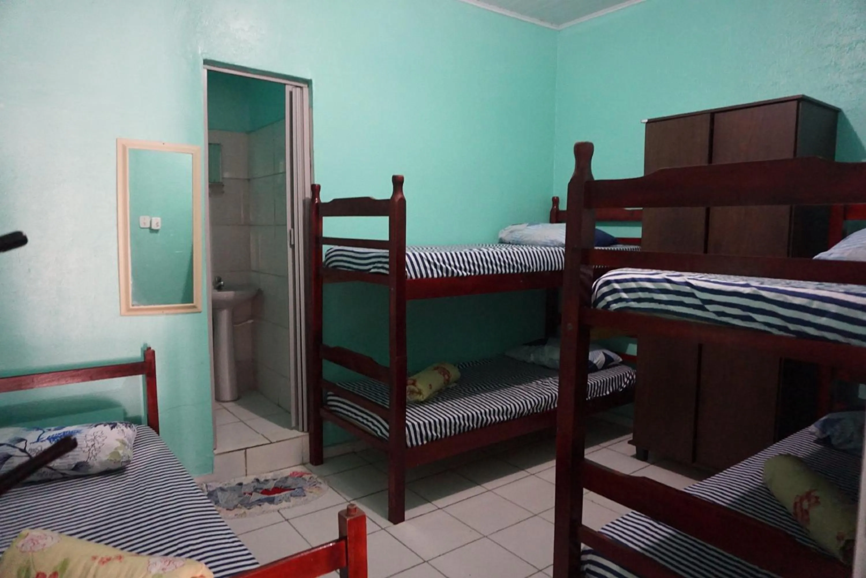 Bed in Pousada Orquidário