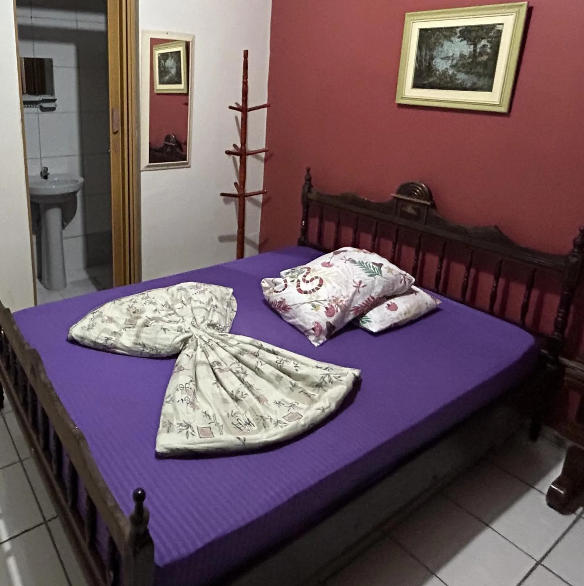 Bed in Pousada Orquidário