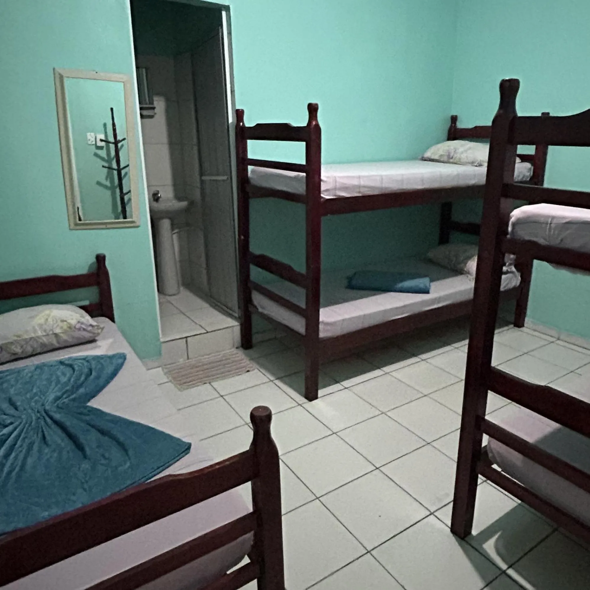 Bed in Pousada Orquidário