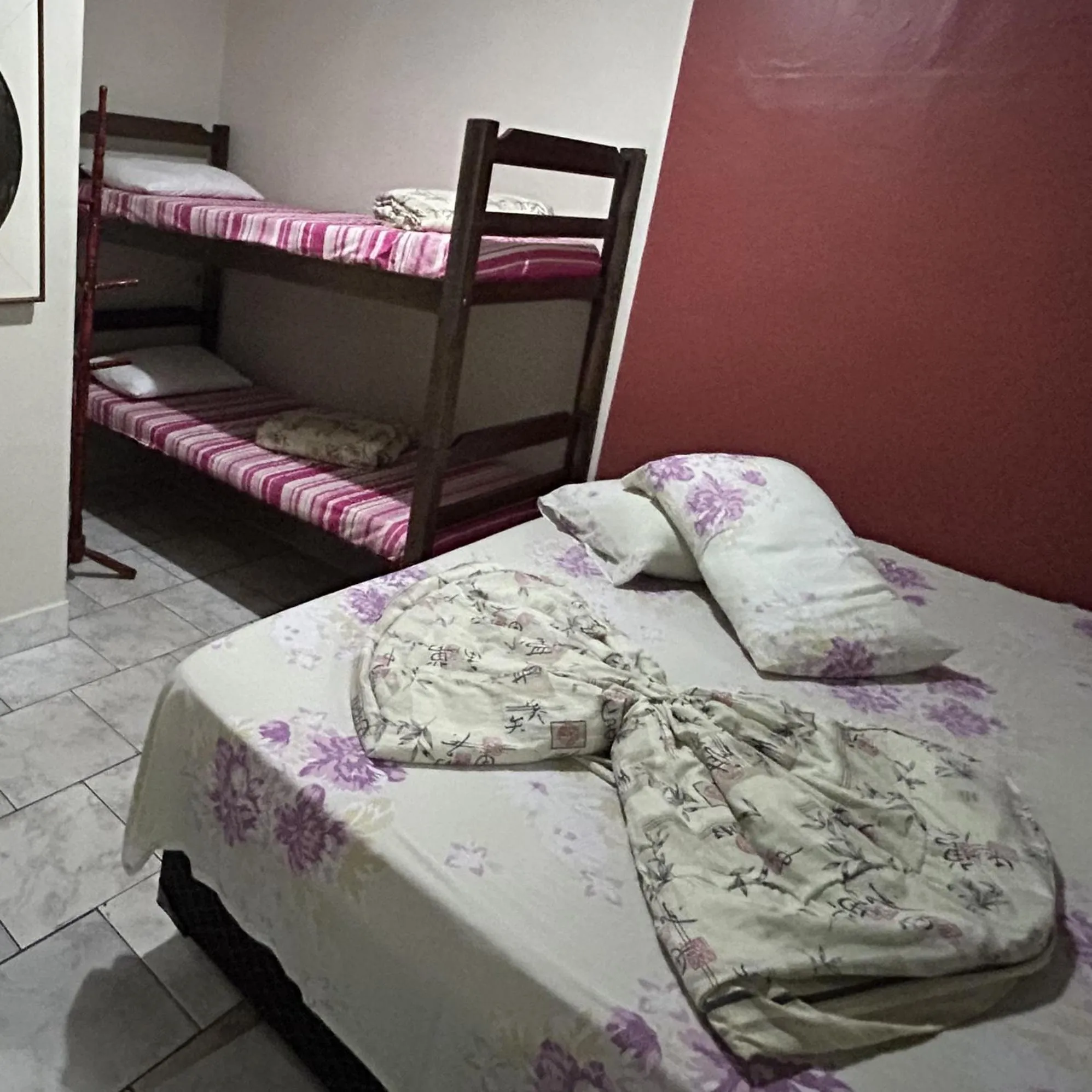 Bed in Pousada Orquidário