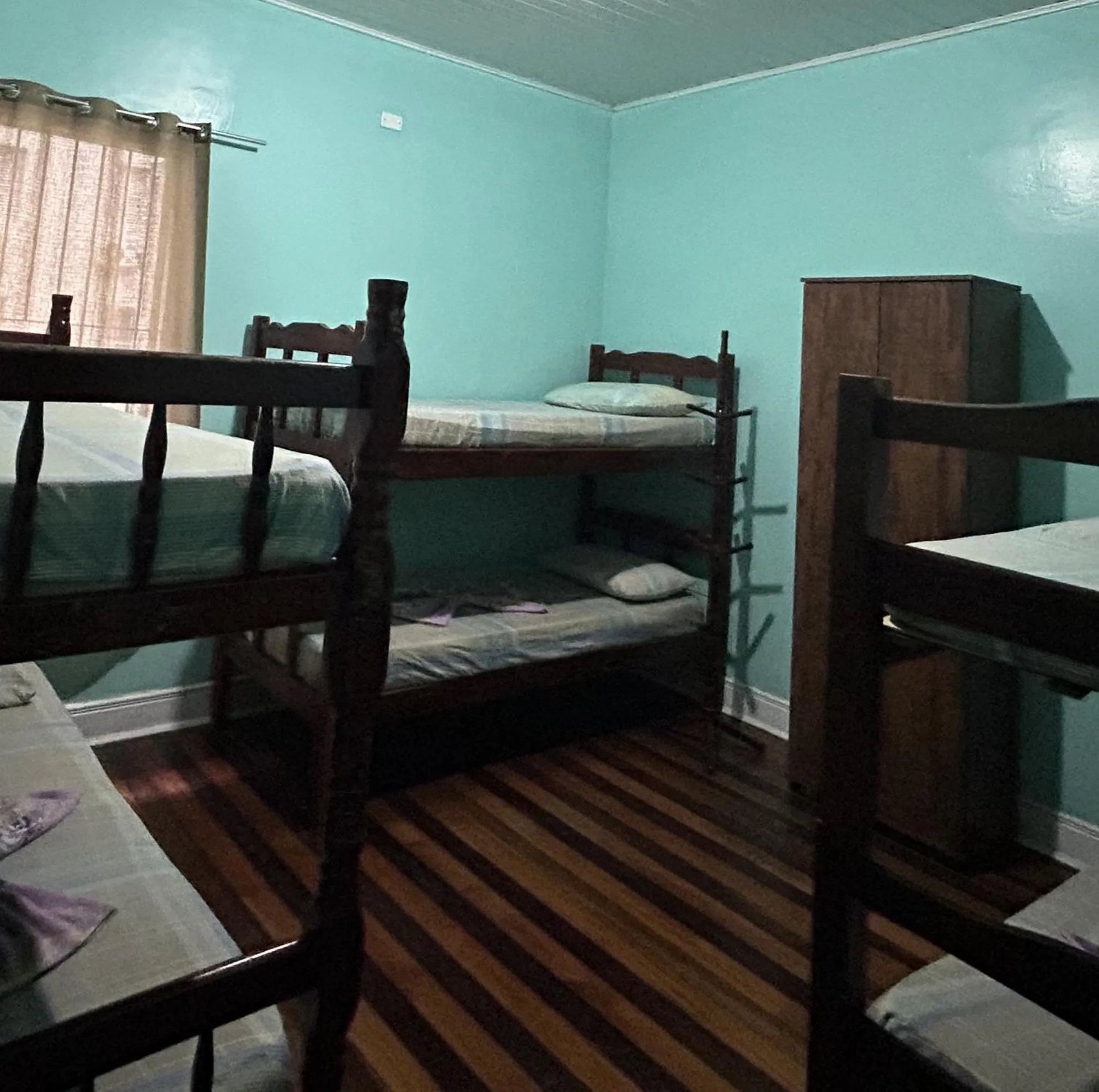 Bed in Pousada Orquidário