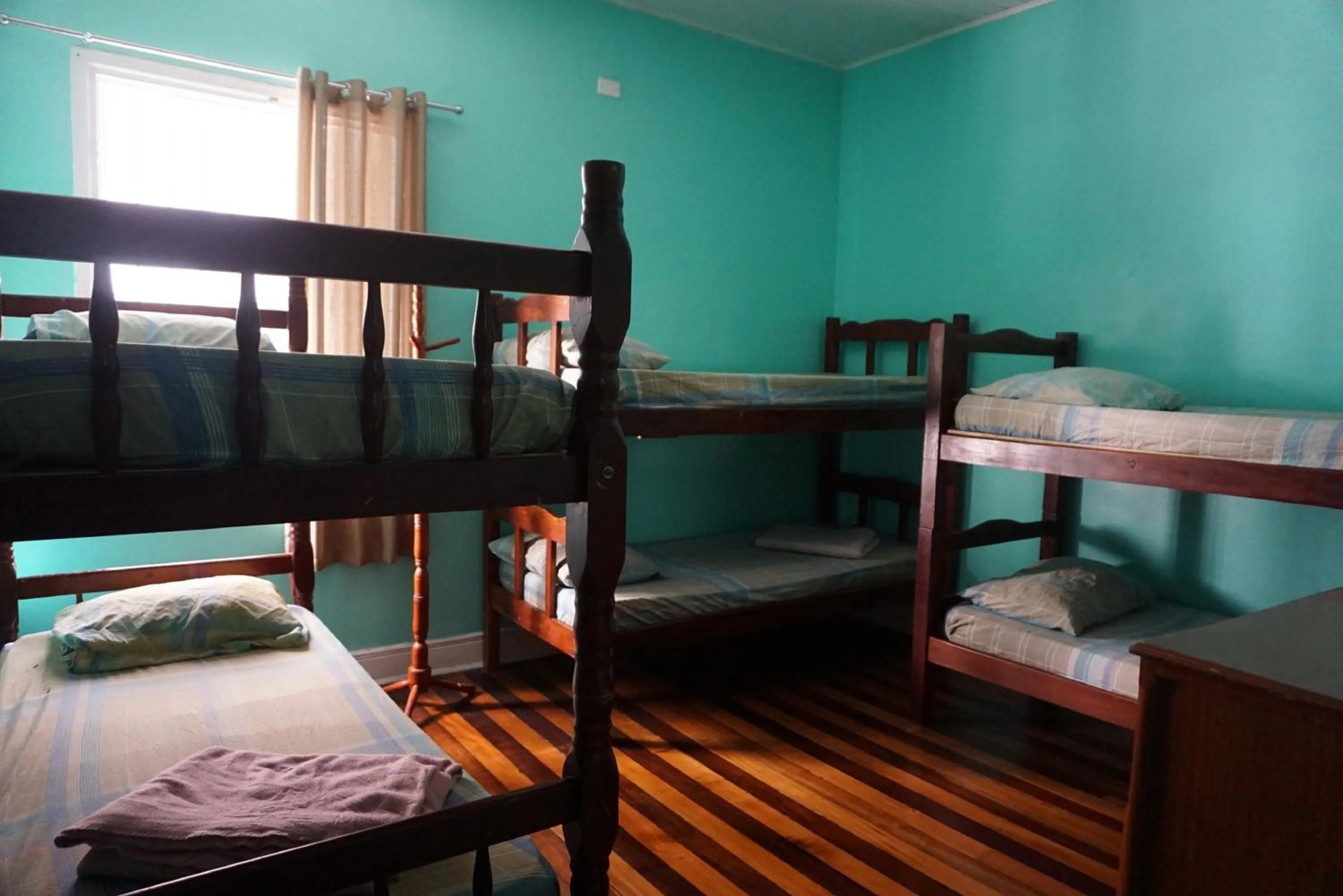 Bed in Pousada Orquidário