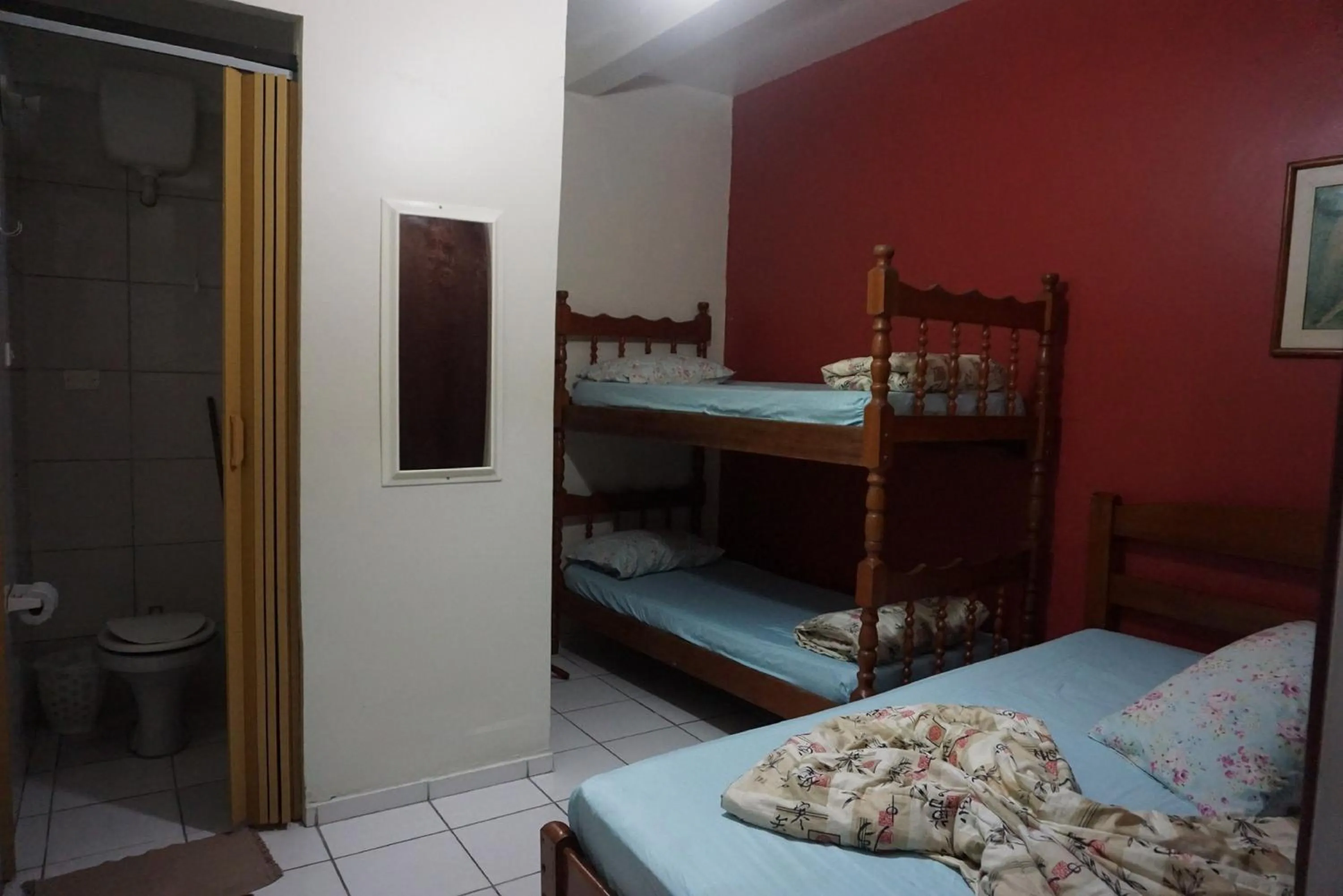 Bed in Pousada Orquidário