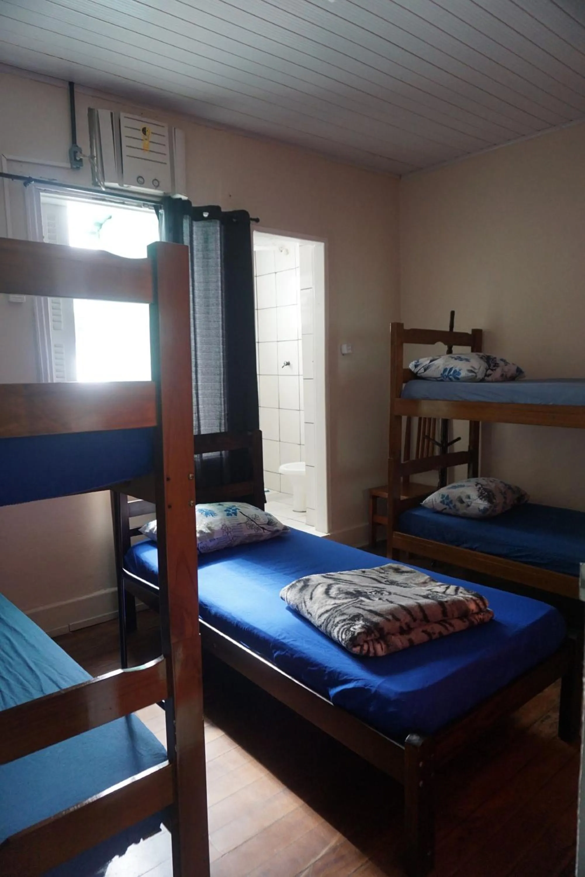 Bed in Pousada Orquidário