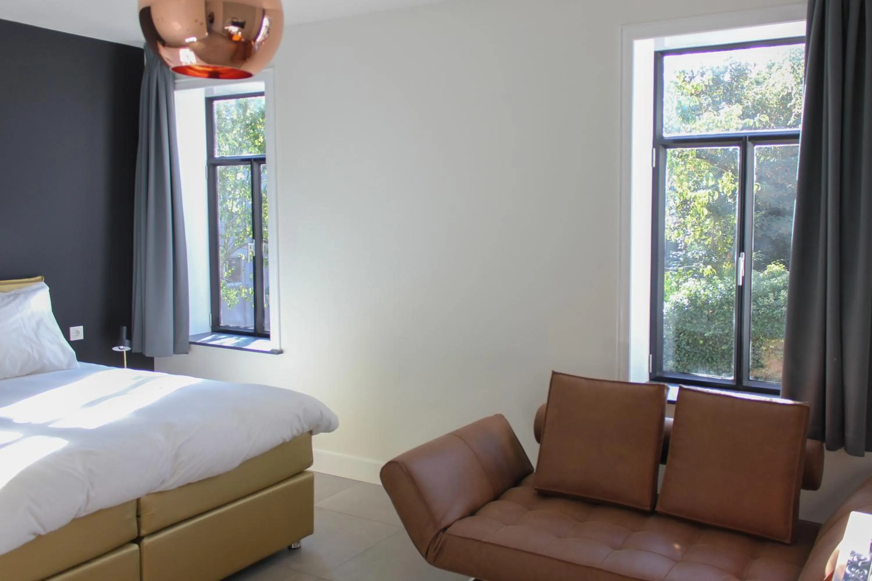 Photo of the whole room, Bed in Boutique Hotel Nieuw Uilenburg