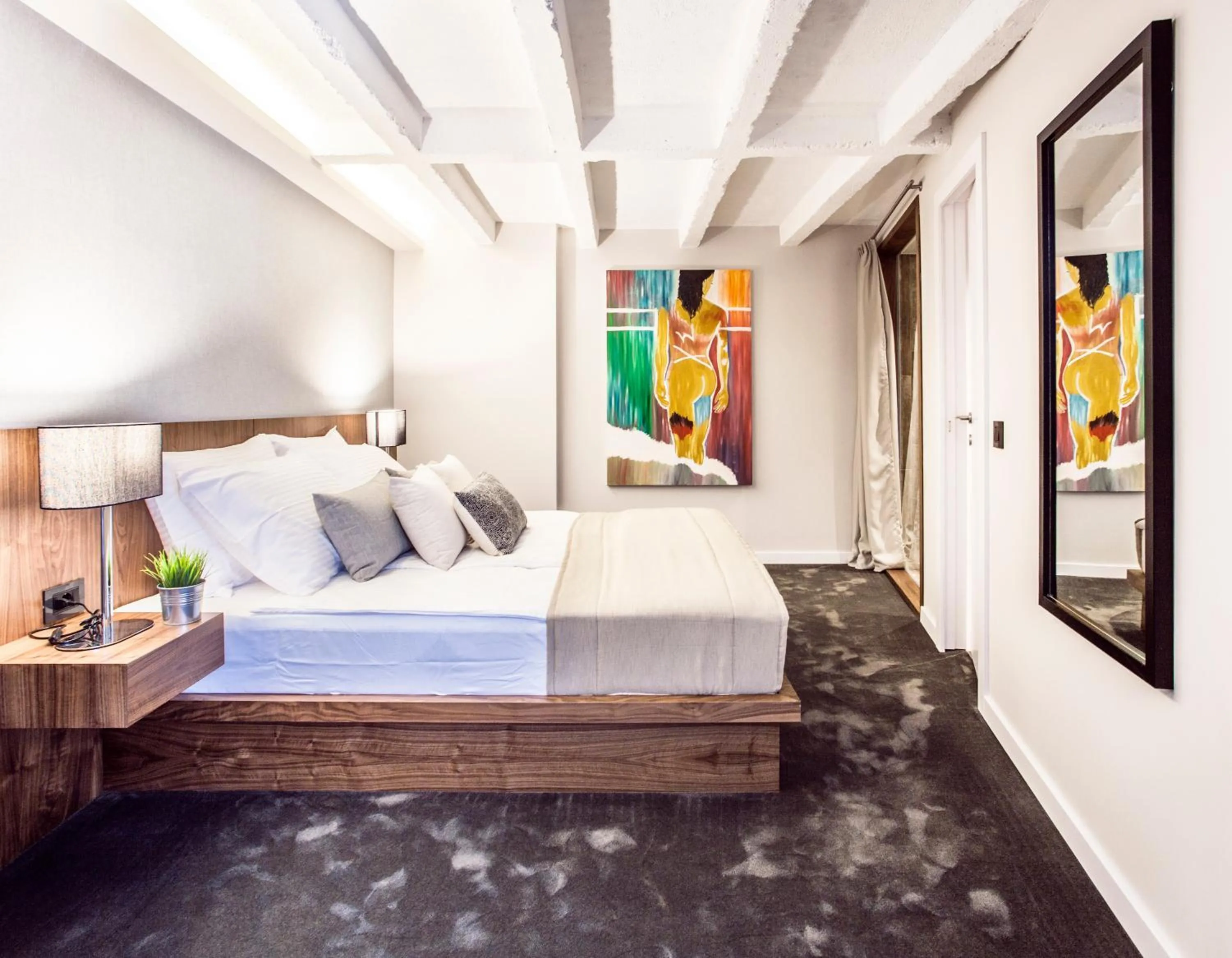 Bed in Nomad Luxury Suites