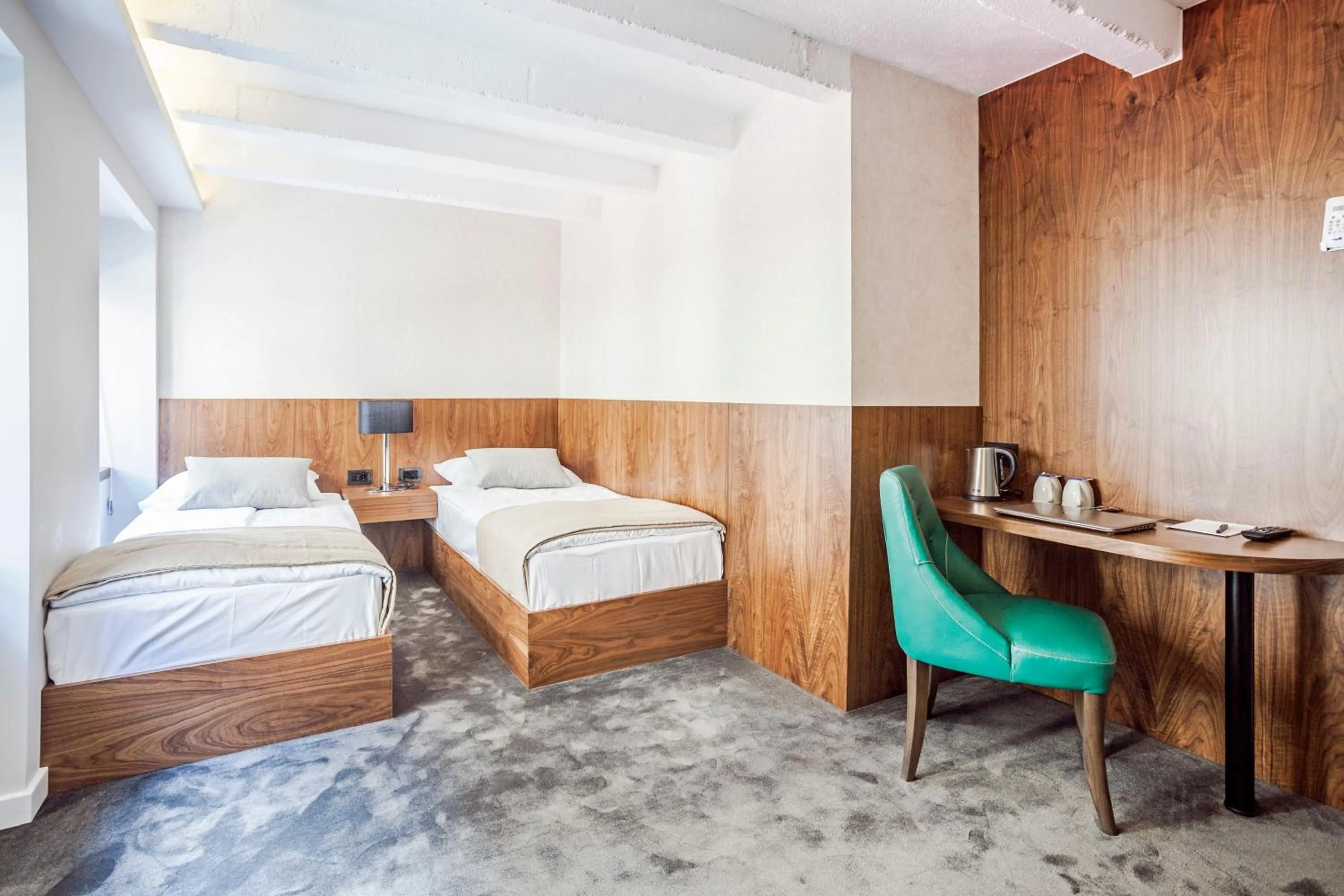 Bed in Nomad Luxury Suites