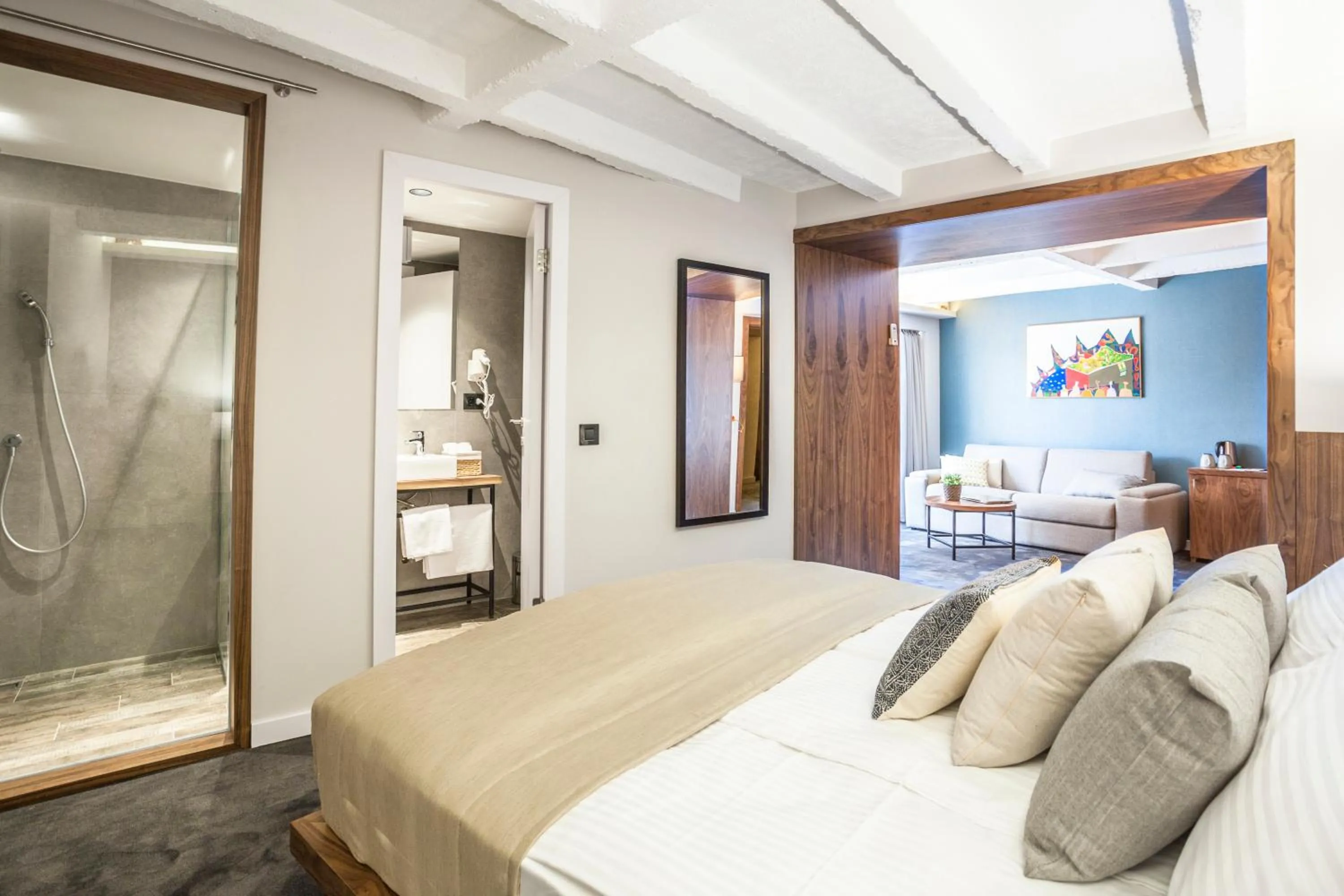 Shower, Bed in Nomad Luxury Suites