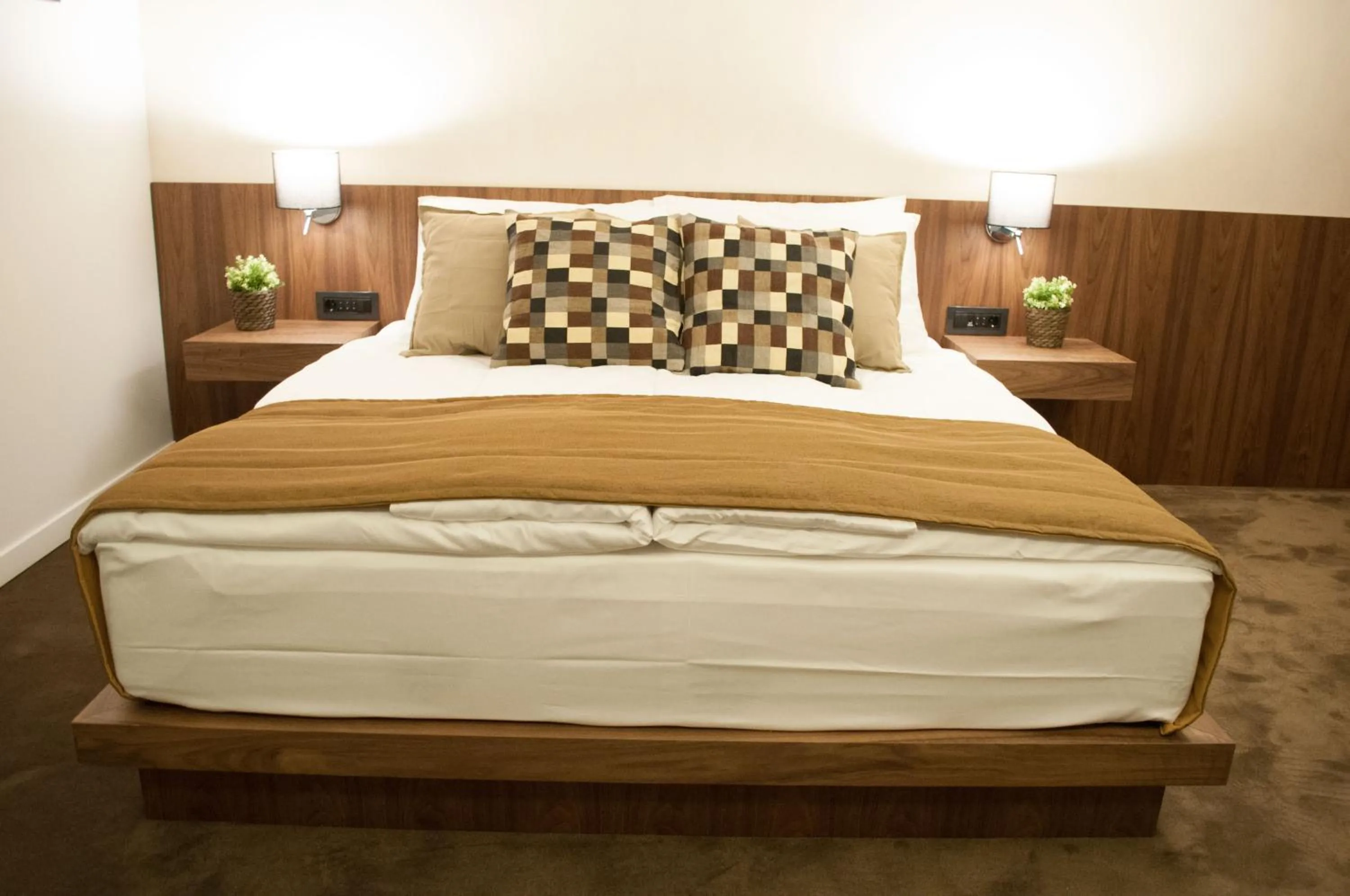 Bed in Nomad Luxury Suites