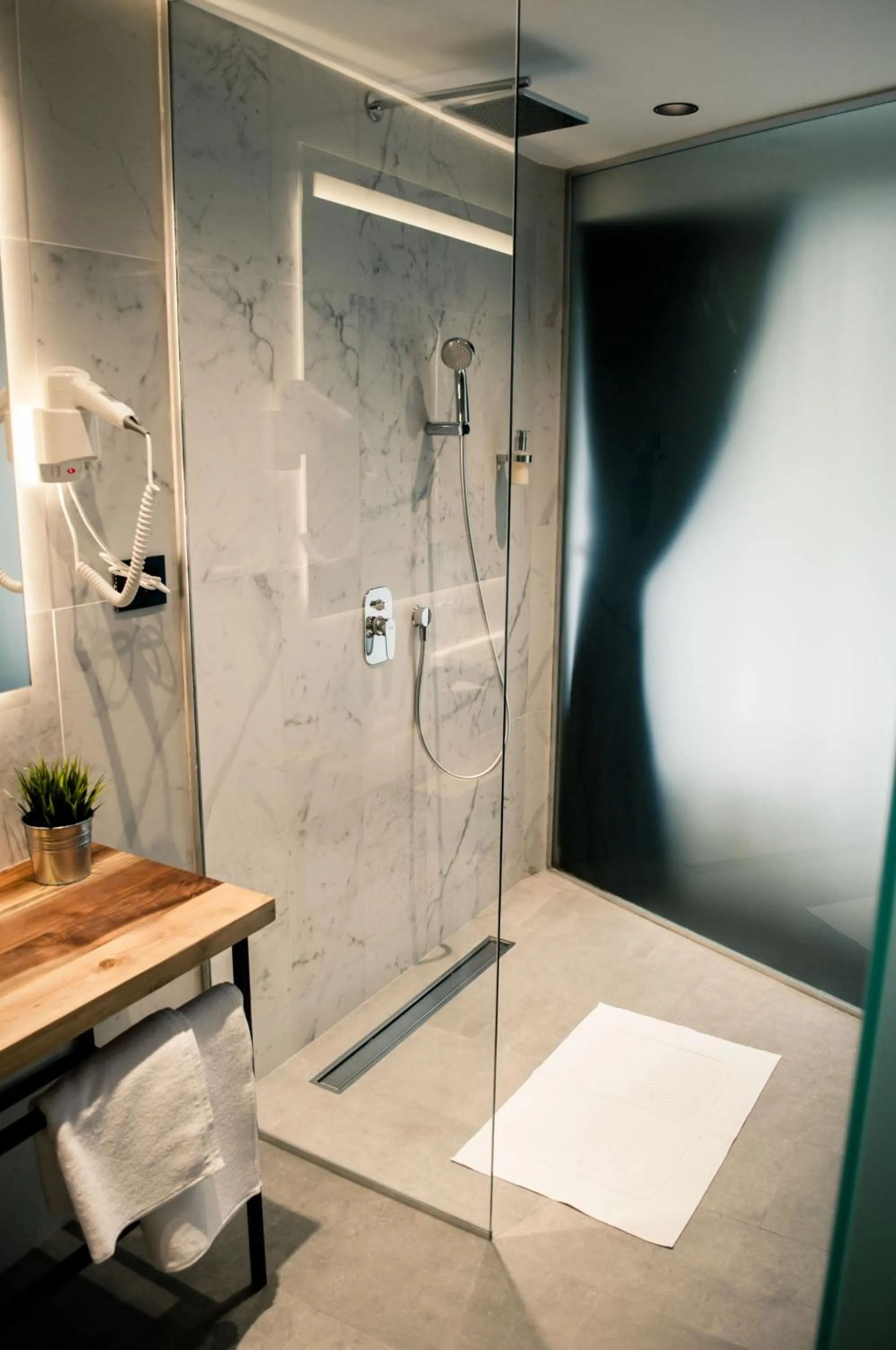 Shower in Nomad Luxury Suites