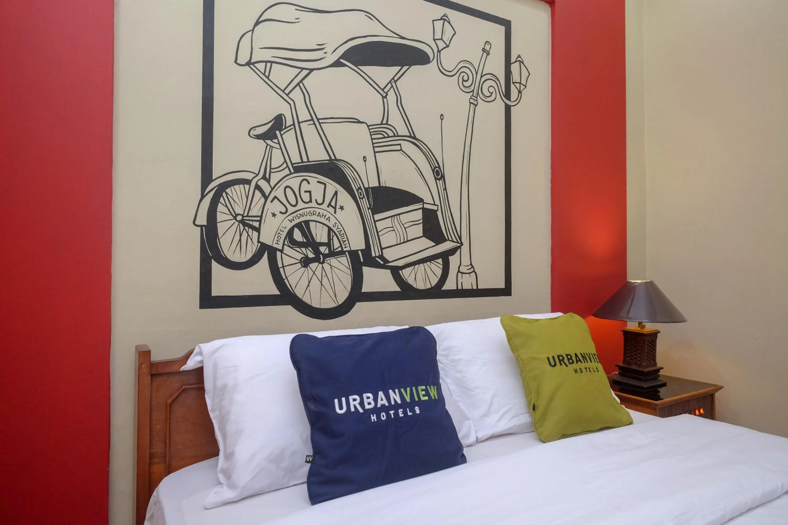 Bedroom, Bed in Urbanview Hotel Syariah Wisnugraha by RedDoorz