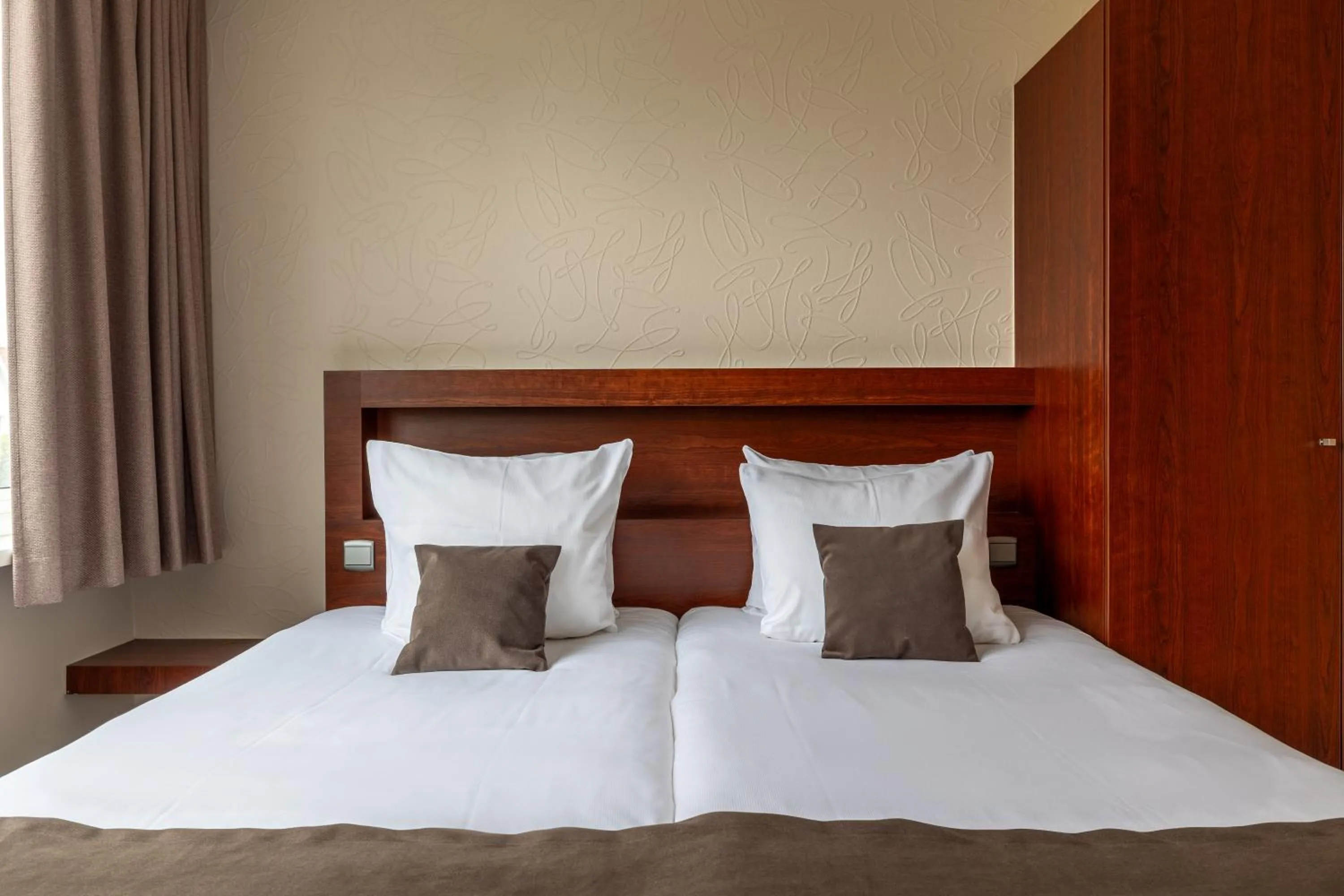 Bed in Hotel Olympia in Bruges