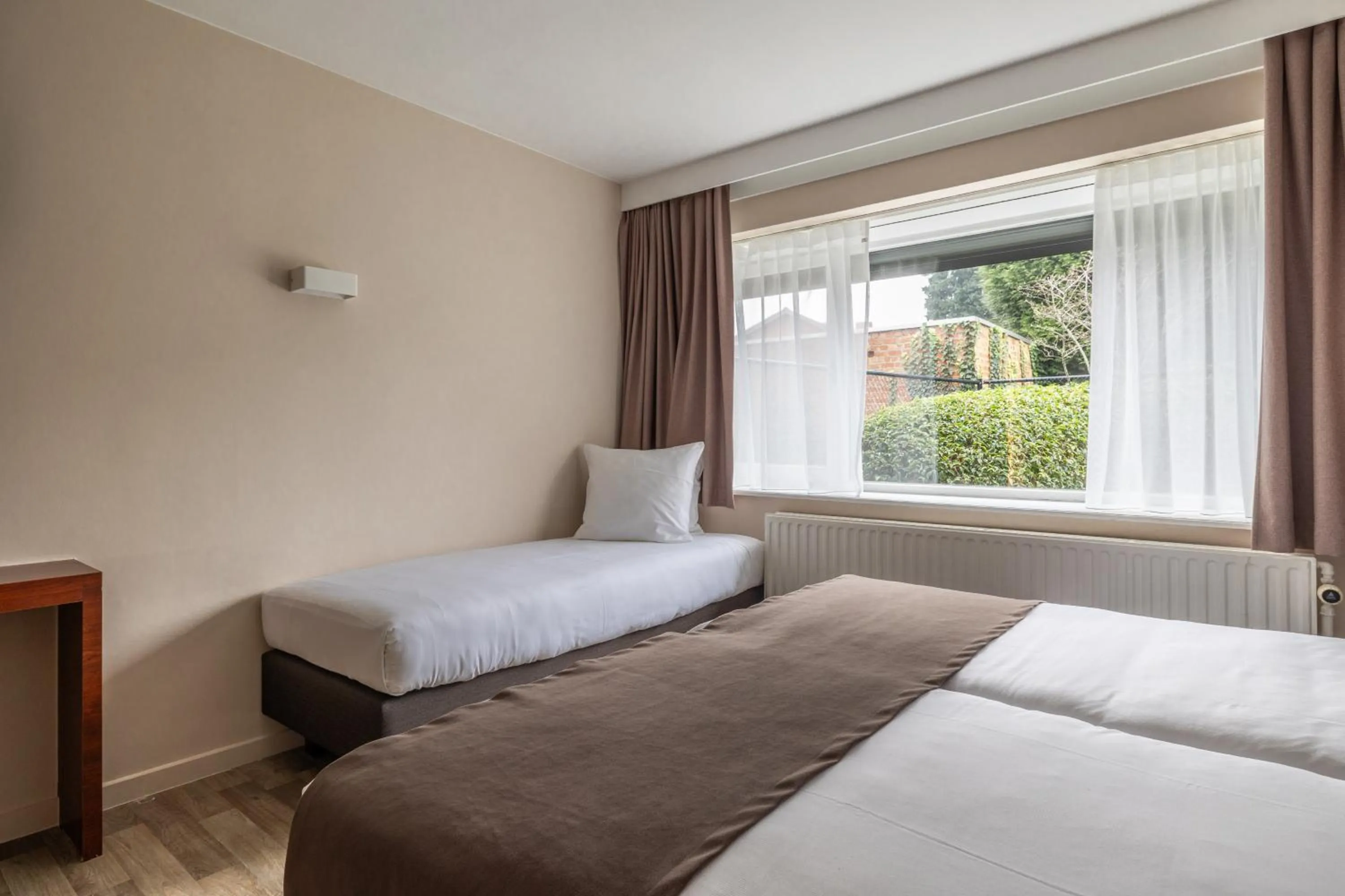 Bed in Hotel Olympia in Bruges