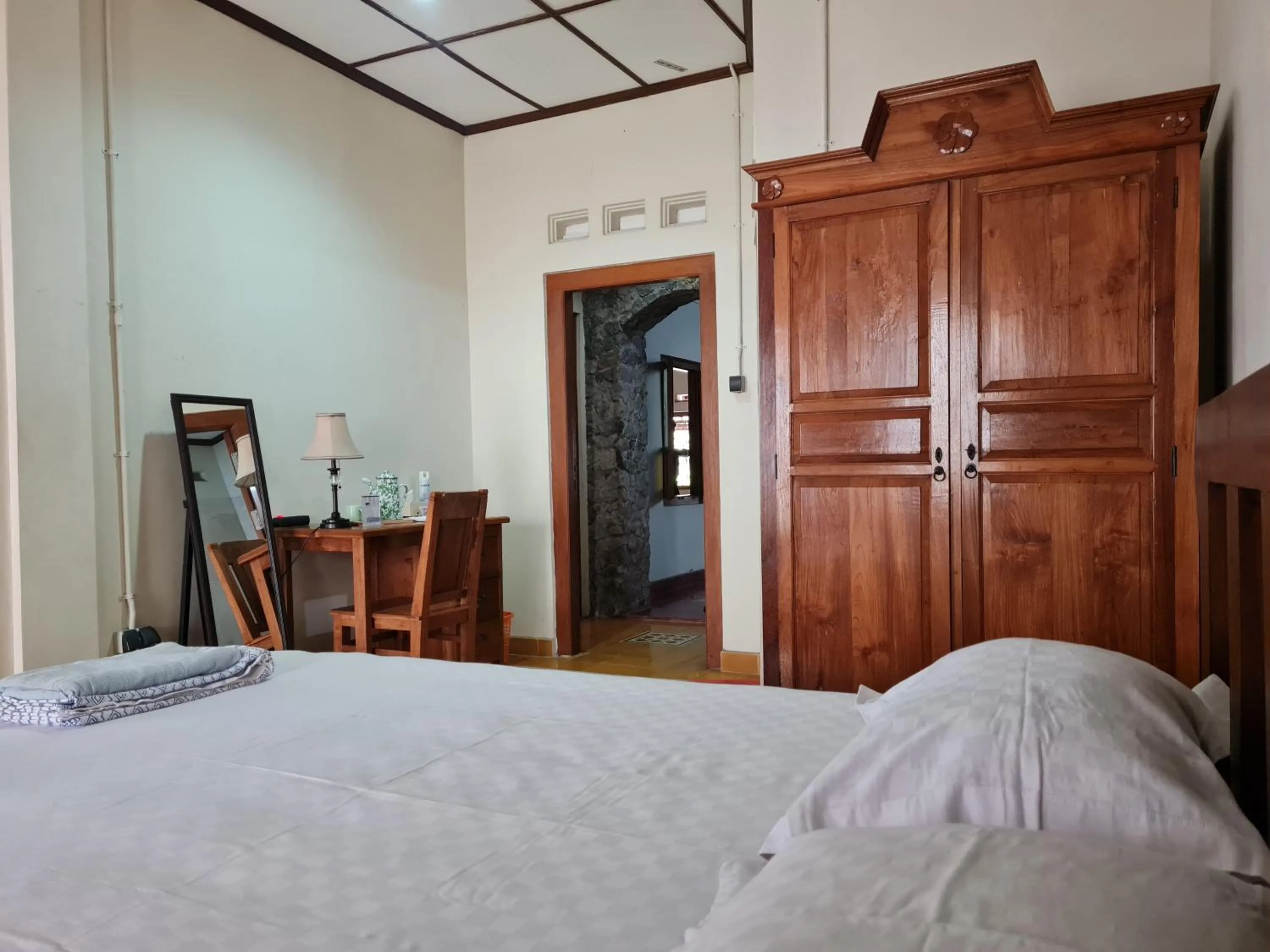 Bed in Omah Pitoe Yogya Homestay