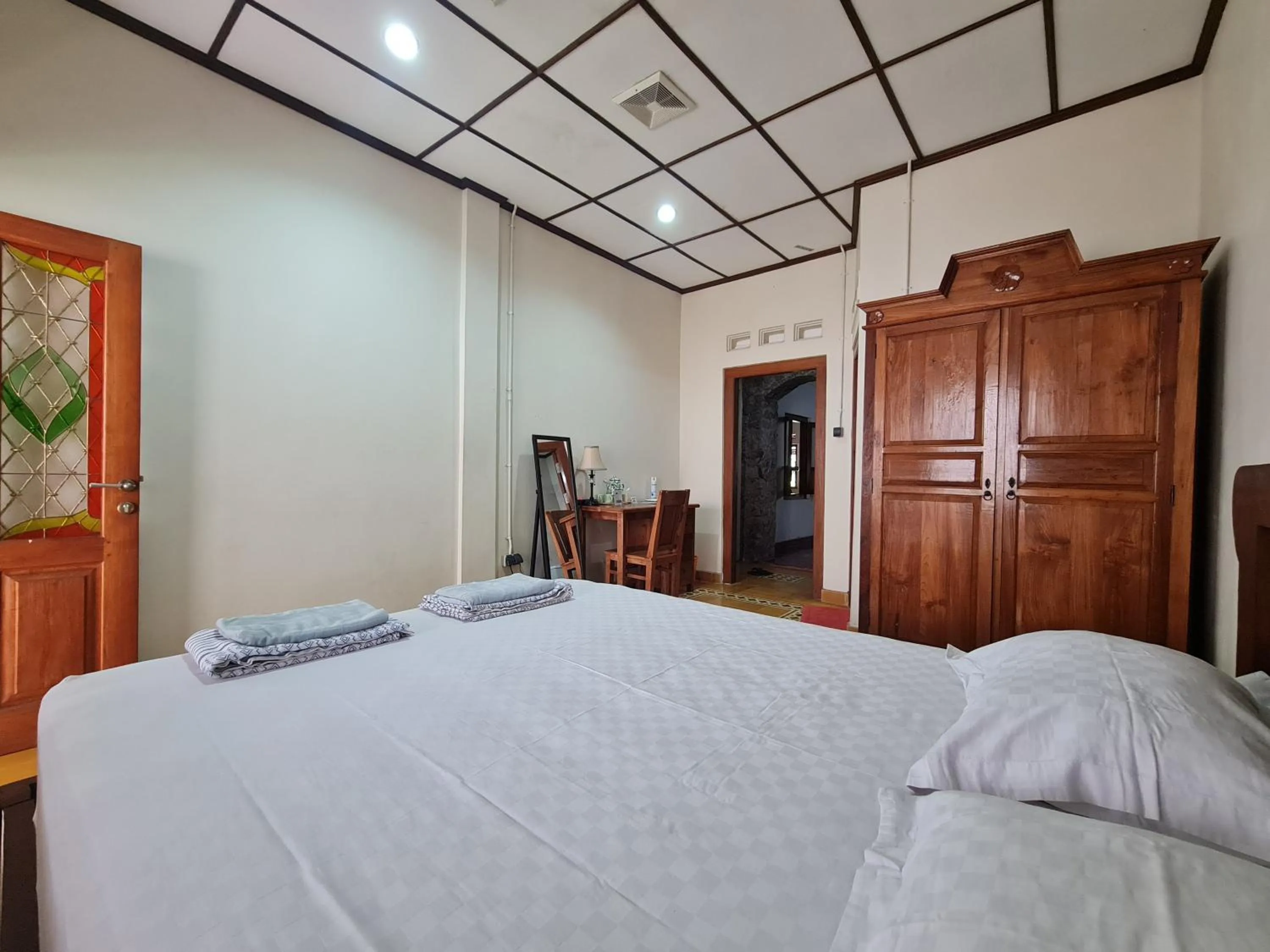 Bed in Omah Pitoe Yogya Homestay
