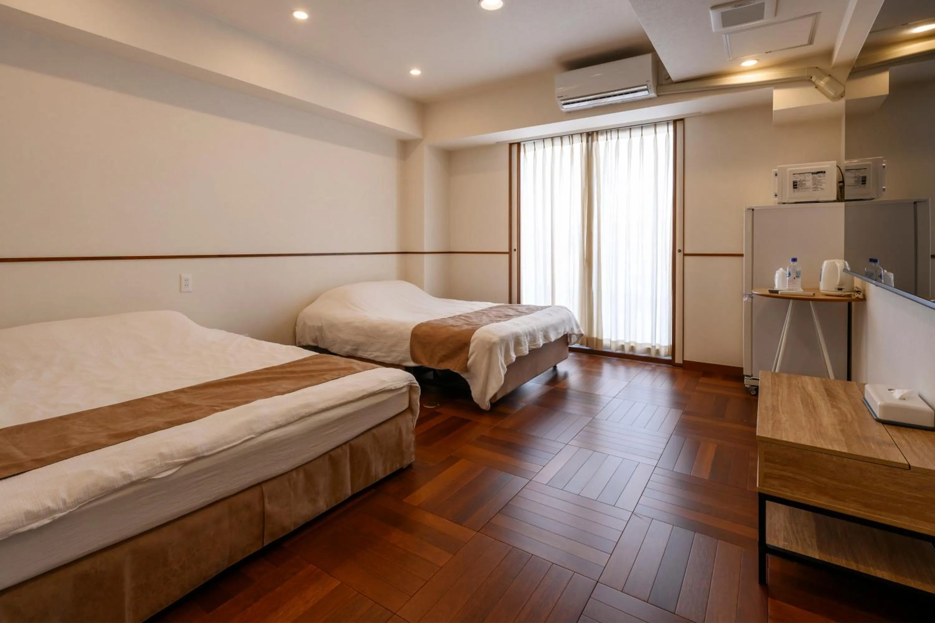 Bed in Hotel Sunset Terrace