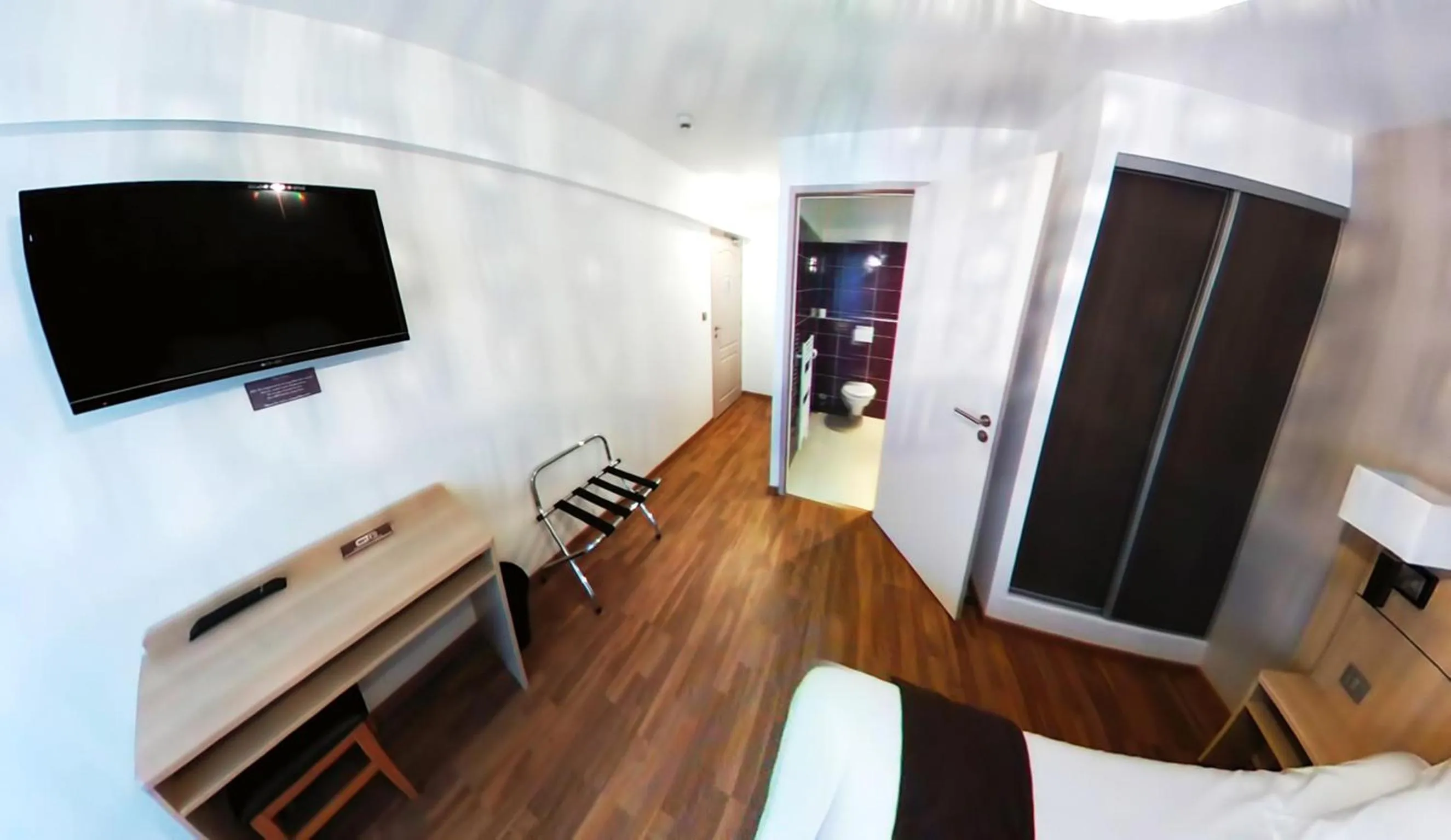 Bedroom in Hotel Au Bon Coin