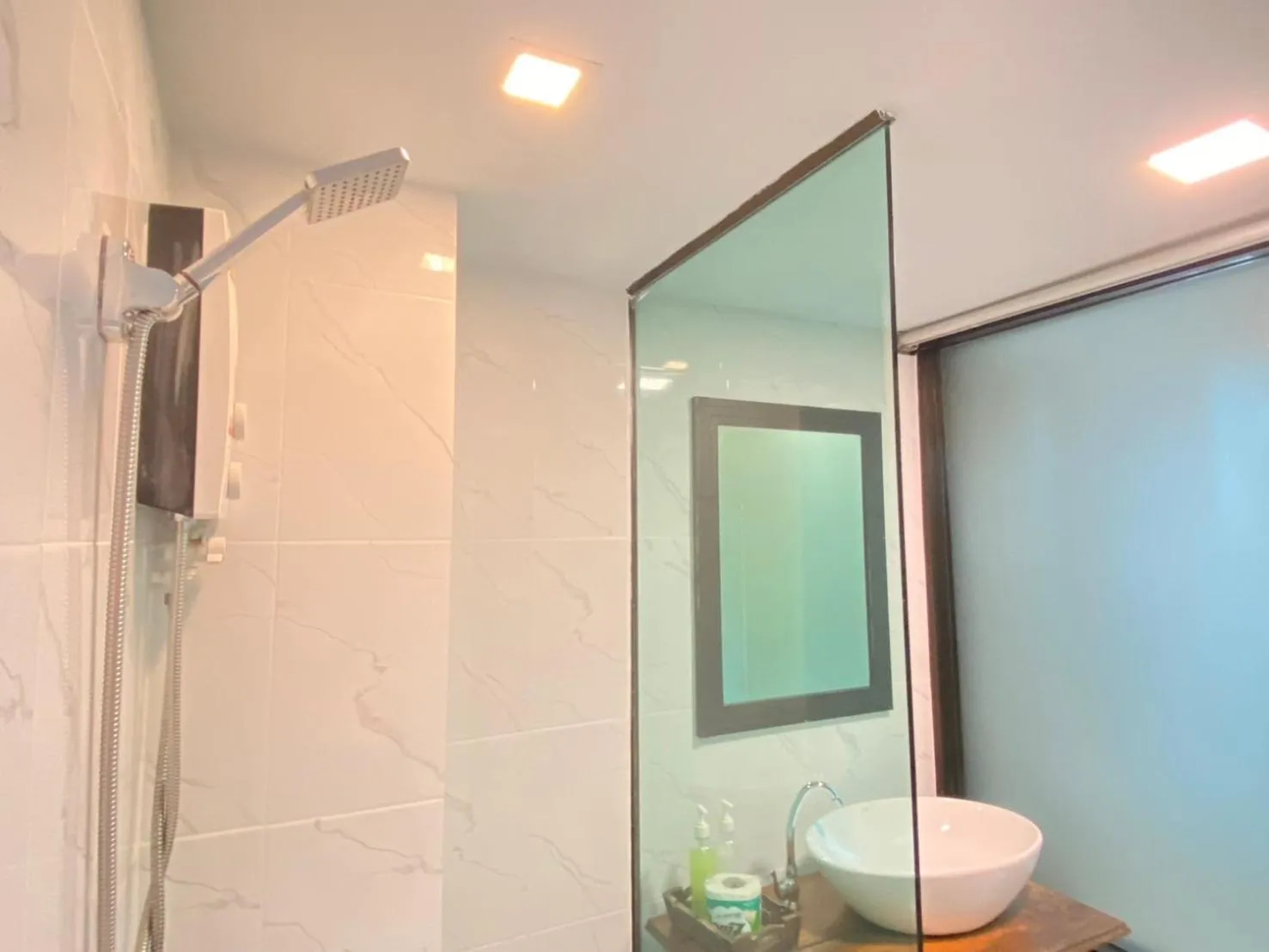 Shower in A Plus Deluxe Hotel