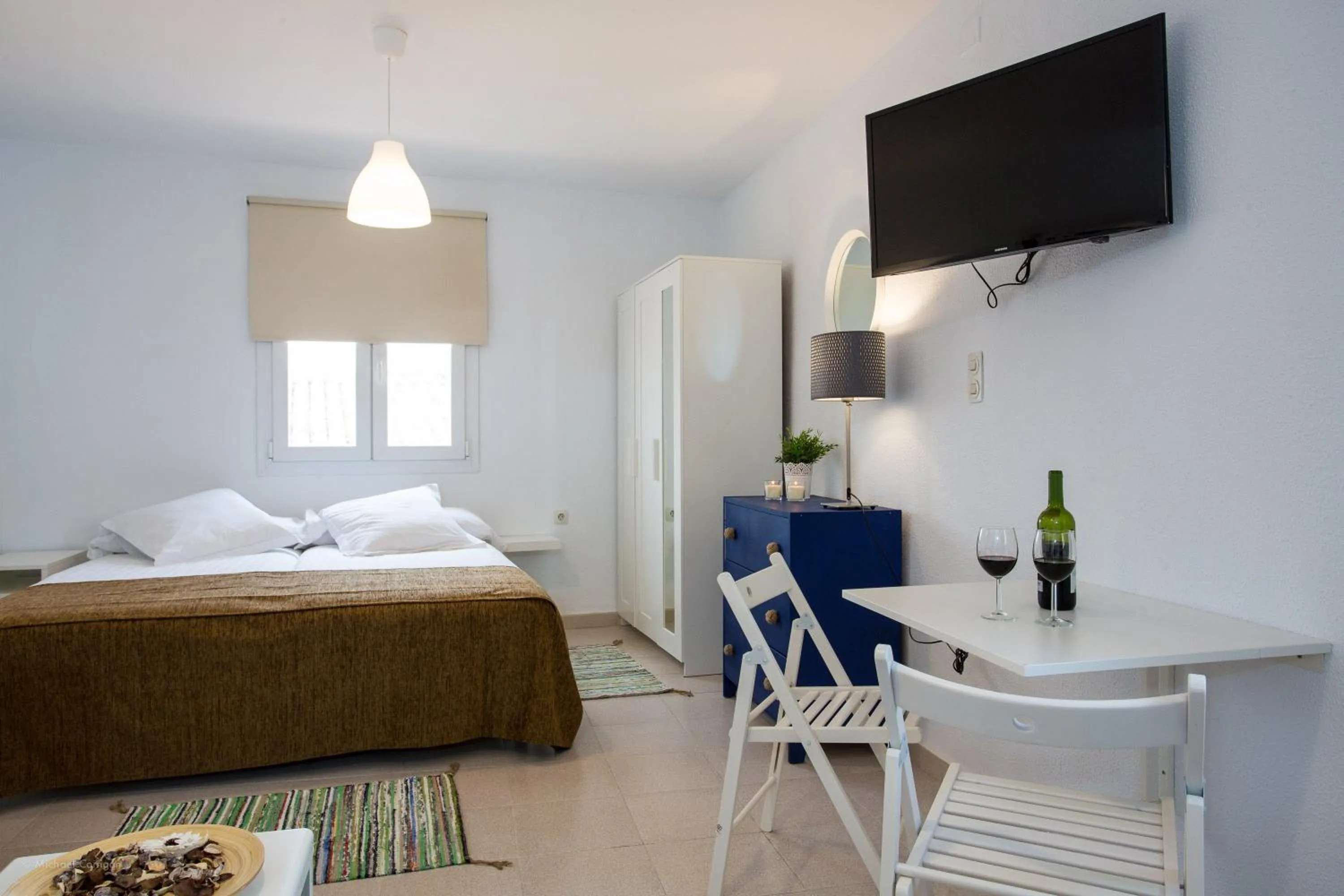 Dining area, Bed in Apartamentos Los Cantaros