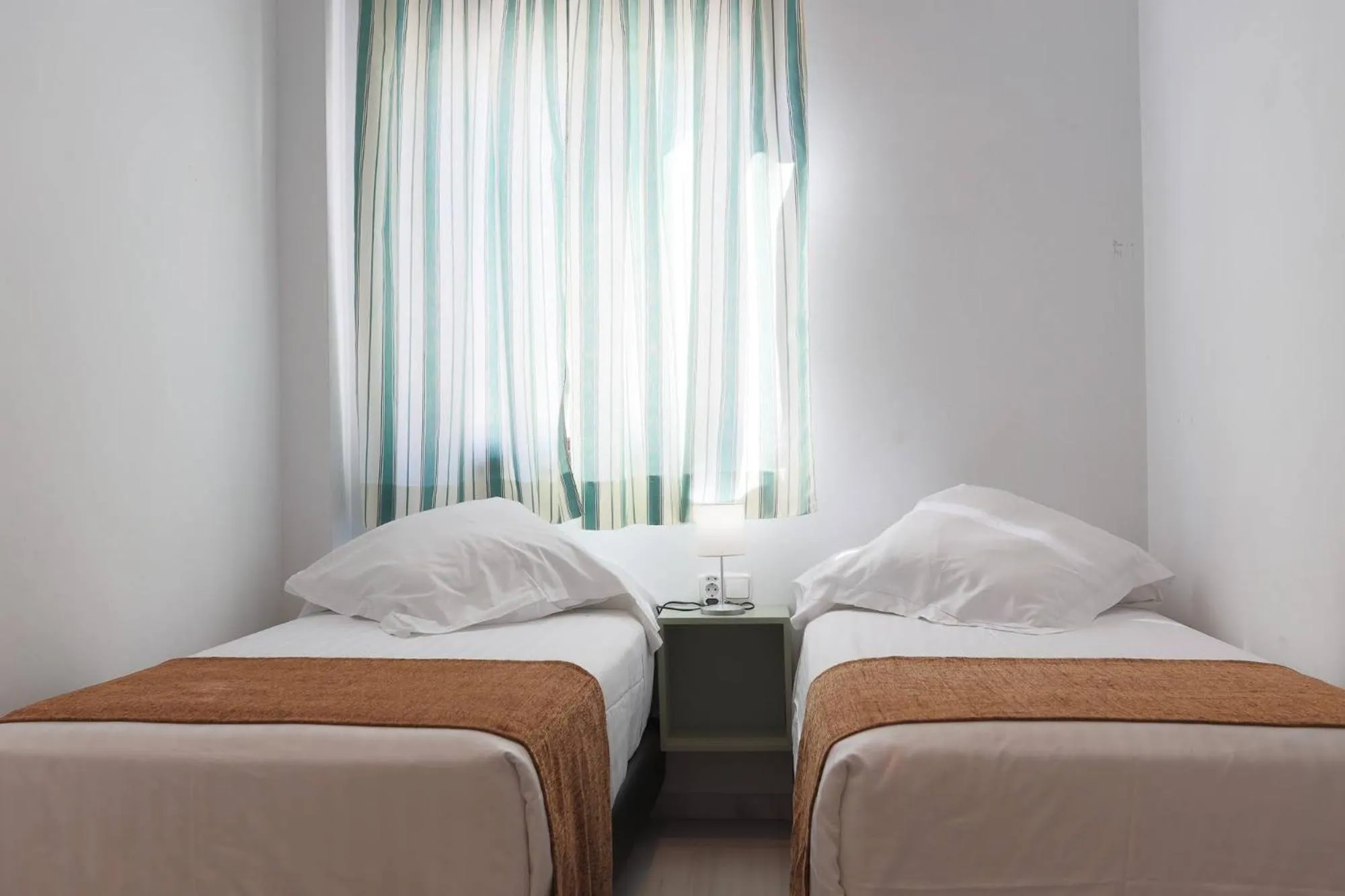 Bed in Apartamentos Los Cantaros